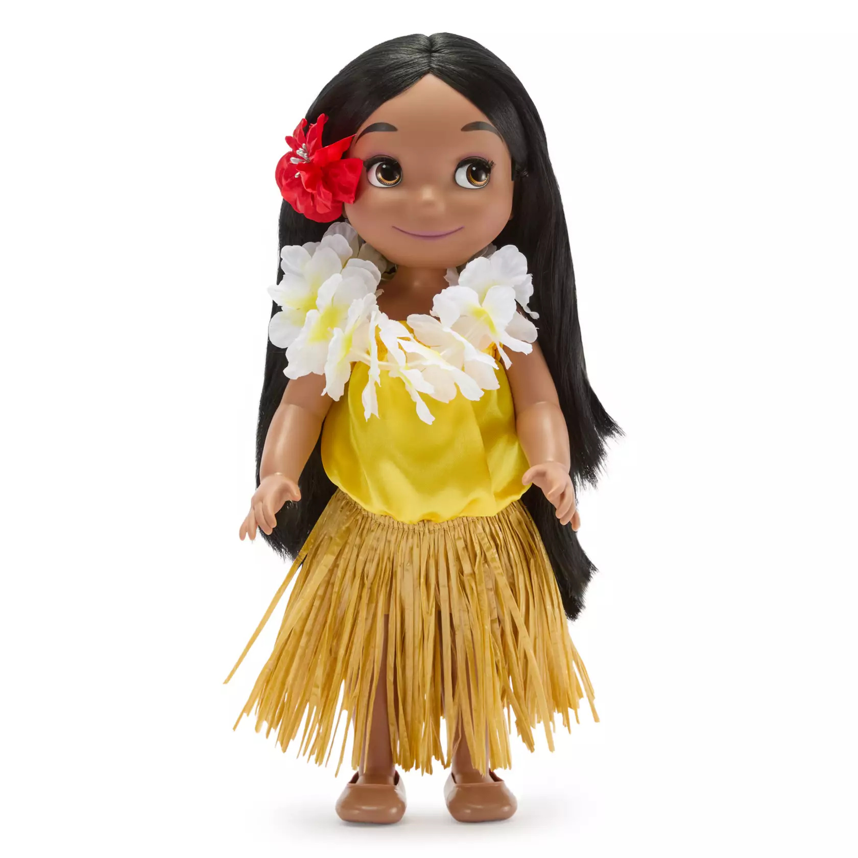 The 15" doll wears a traditional folk costume, which includes a grass skirt, floral lei, and a red floral hair accessory. Press her tummy to hear the doll sing ''it's a small world'' in both Hawaiian and English. The On/Off switch is located on the doll's left side. It also comes in collector's display box.