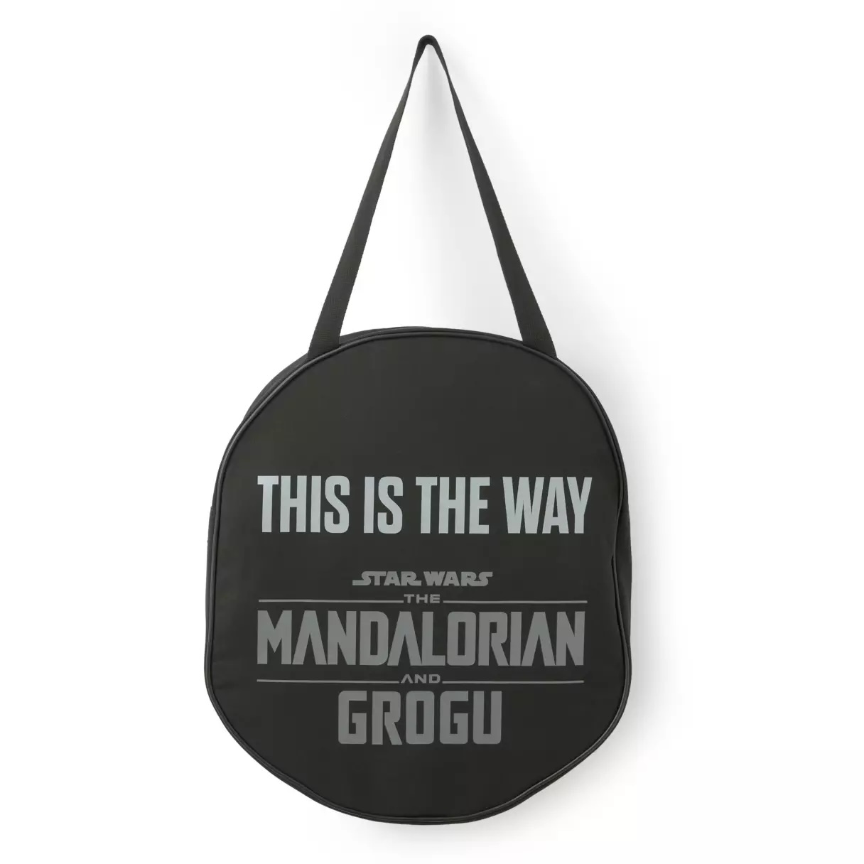 One of Disney's "Big Face" bags, the front of this canvas tote features the Mandalorian's helmet. On the back is screen art of "This is the way" and the film logo. It has a metal D-ring attached to one of the straps for bag charms. It has a zip closure. It's 100% cotton. The bag is about 12" tall and 12" wide.