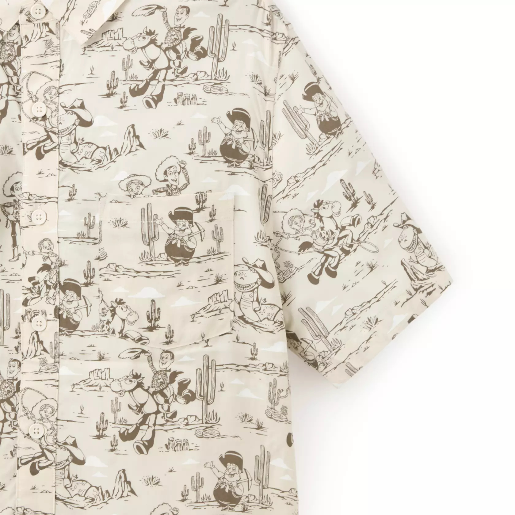 This off-white button down shirt has an allover print pattern featuring the Woody's Roundup cast of western characters from Toy Story, including Woody, Jessie, Bullseye, Stinky Pete, and Rex.
