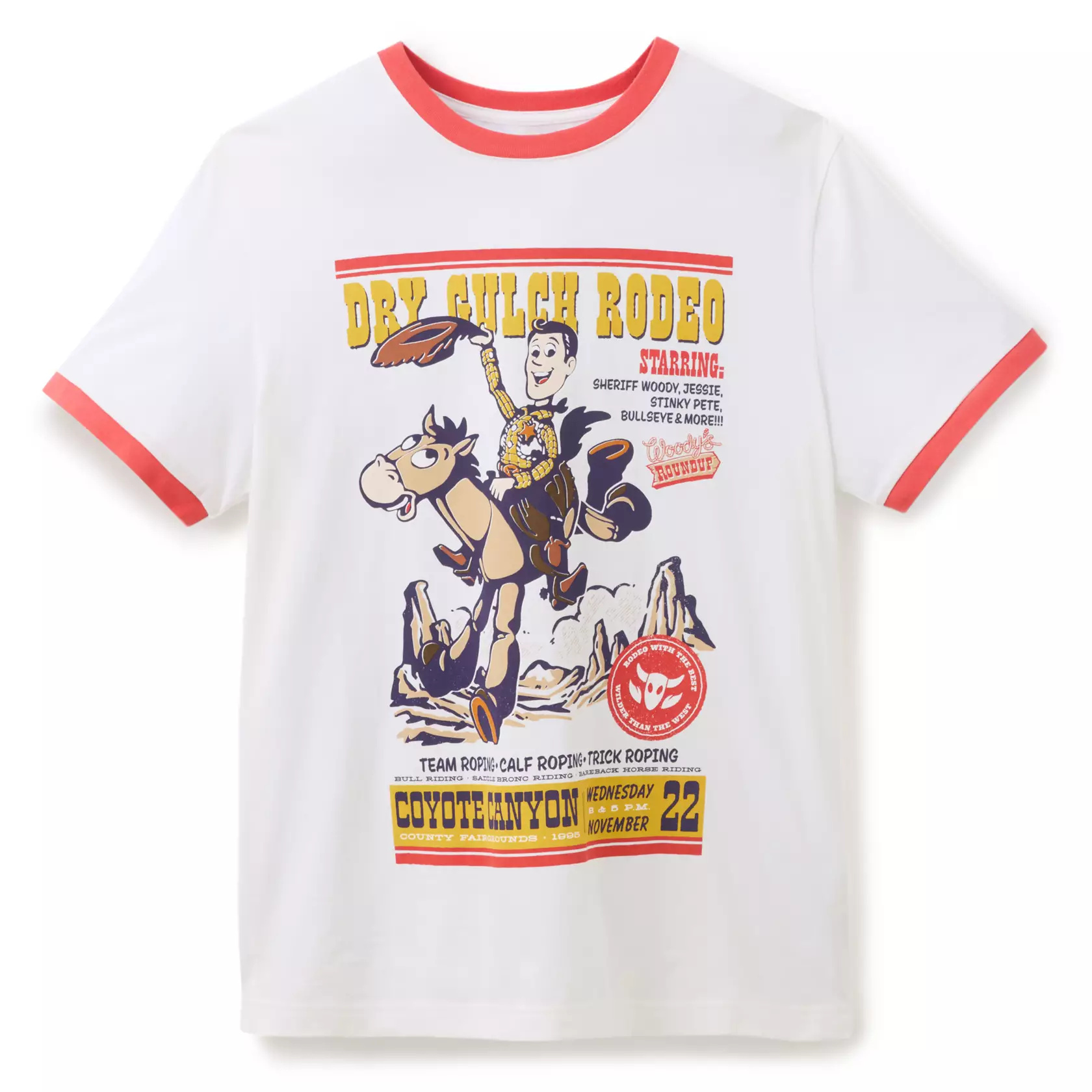 The ringer tee includes vintage poster style art of ''Dry Gulch Rodeo'' at ''Coyote Canyon County Fairgrounds'' and Woody and Bullseye. The collar and sleeves have red contrast hems.