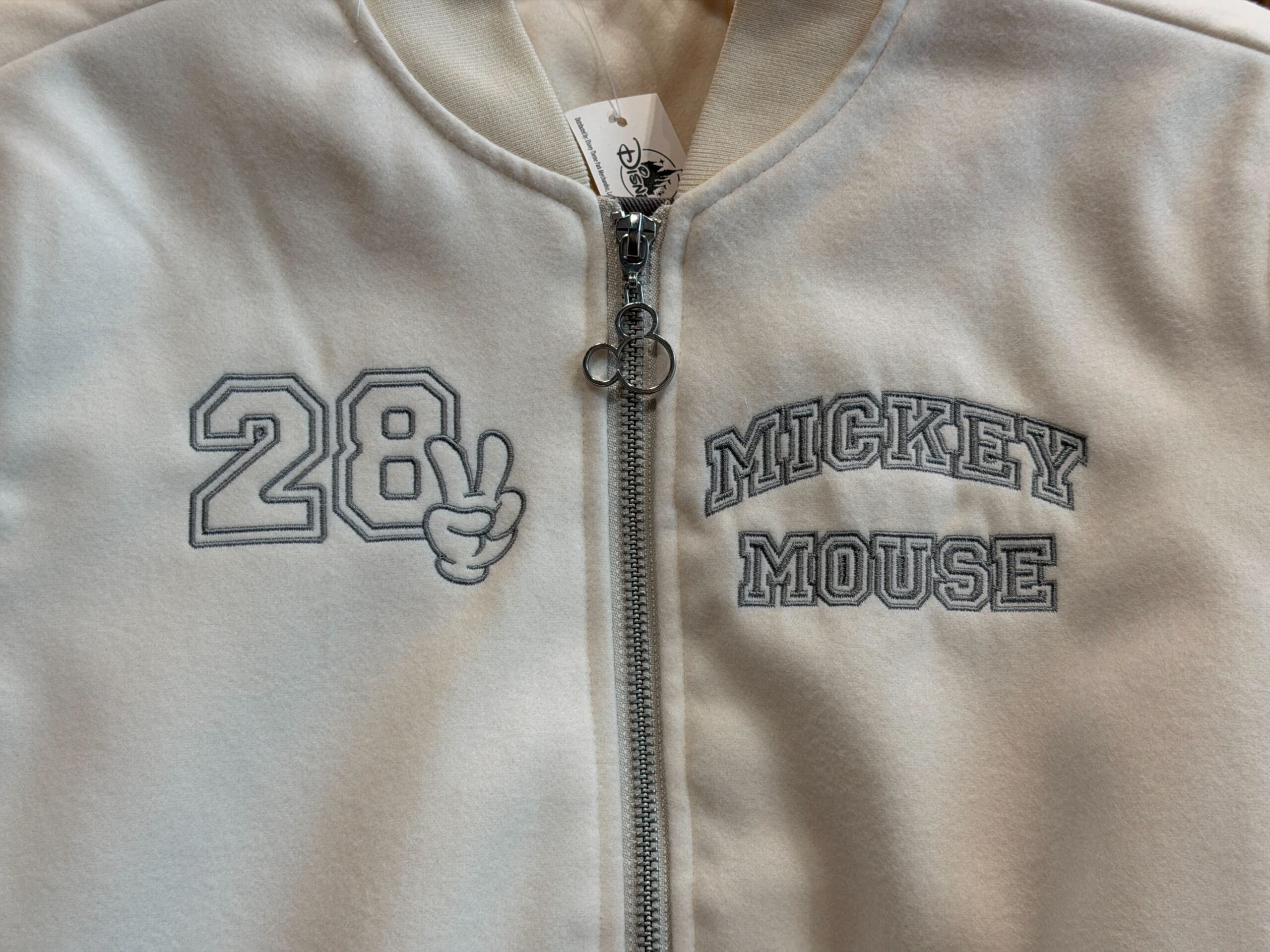 Close-up of front of Mickey Bomber Jacket.