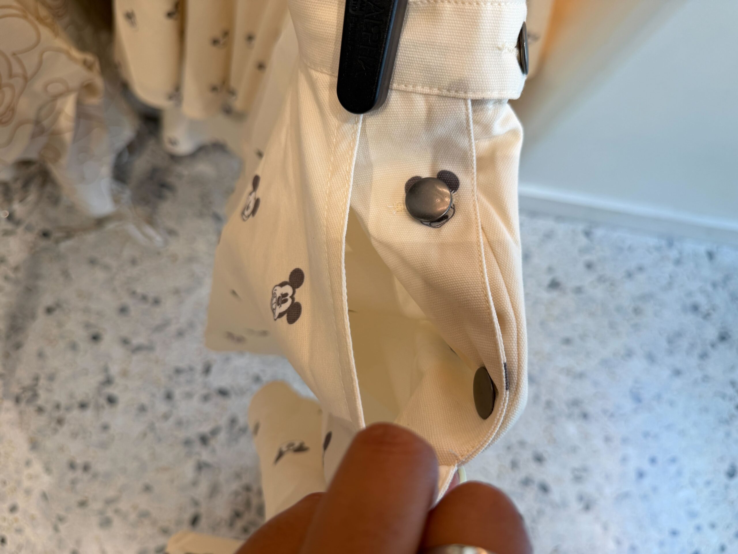Side buttons on the Mickey Overalls.