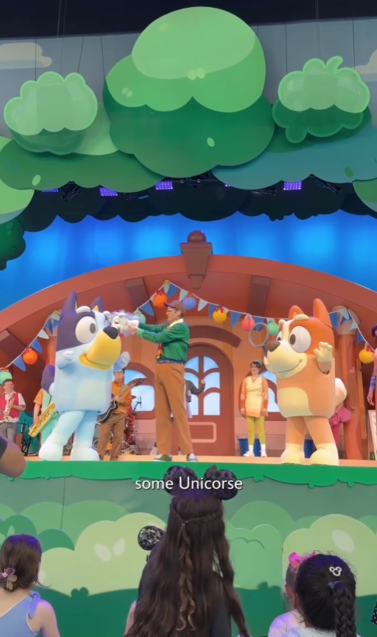 Unicorse on stage with Bluey and Bingo.