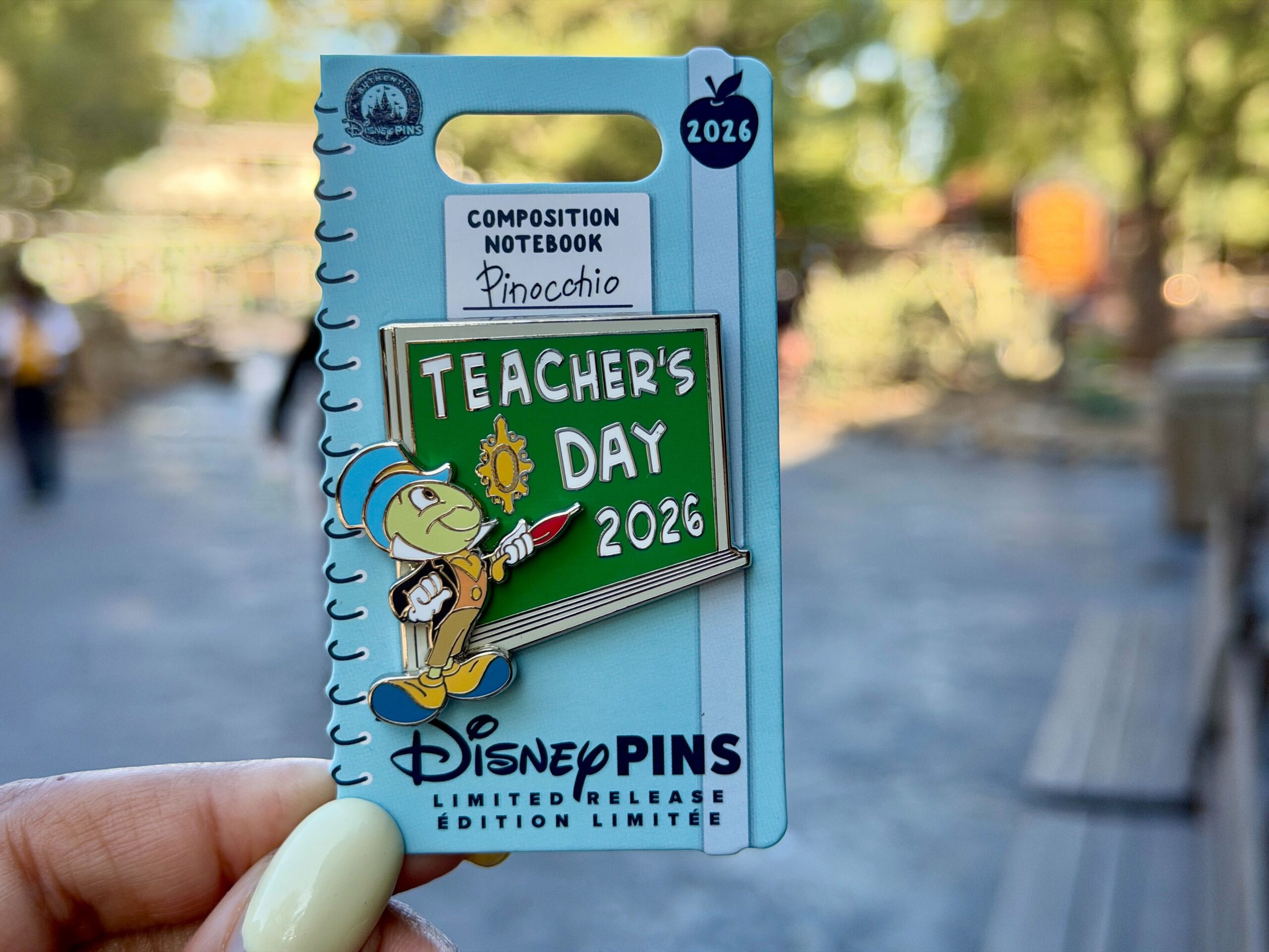 National Teacher Appreciation Day a.k.a. Teacher's Day falls on Tuesday, May 5. The Teacher's Day pin resembles a chalkboard with Jiminy Cricket standing to the side.
