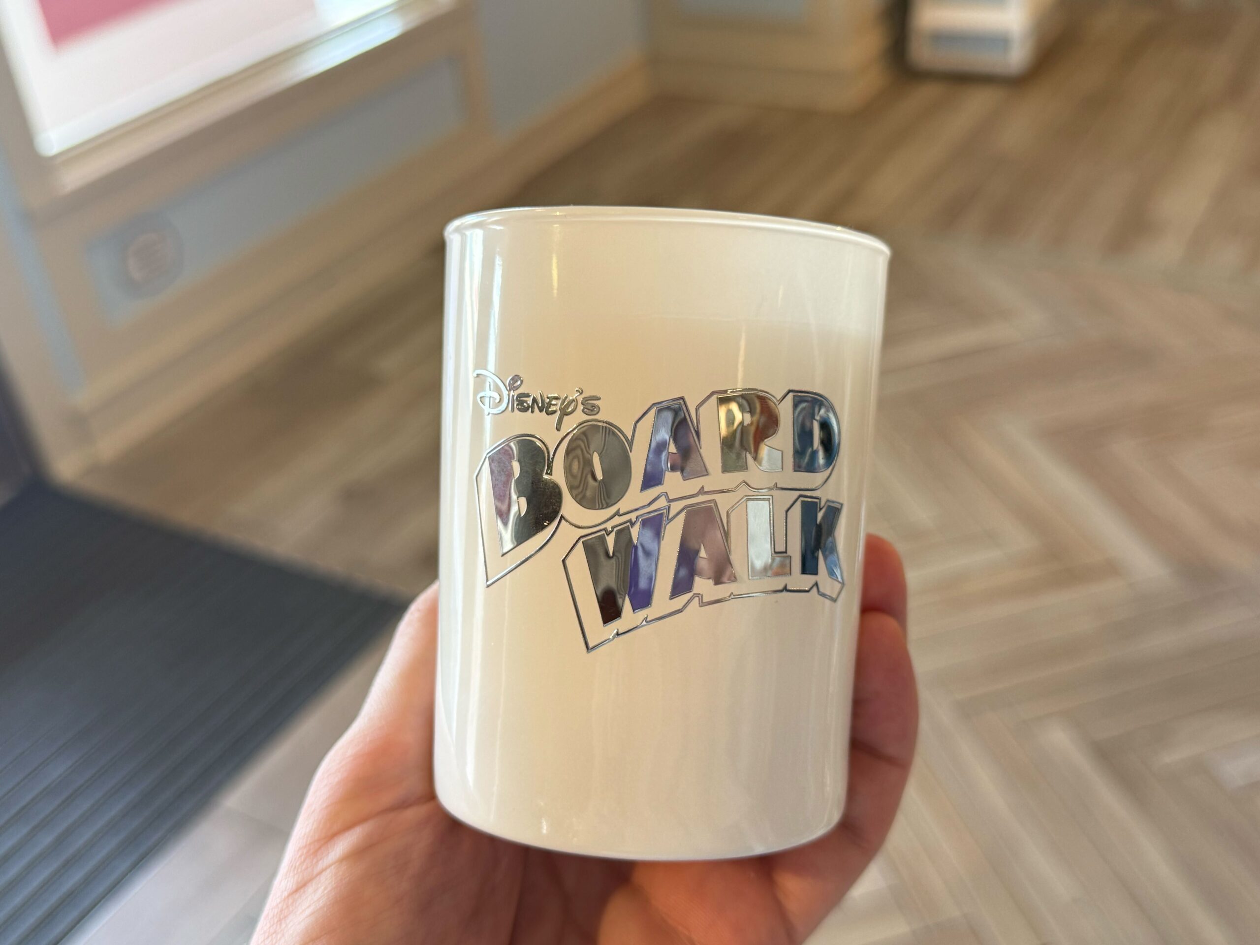 This simple candle has the Boardwalk wordmark on one side. The scent is inspired by the signature scent of the resort.