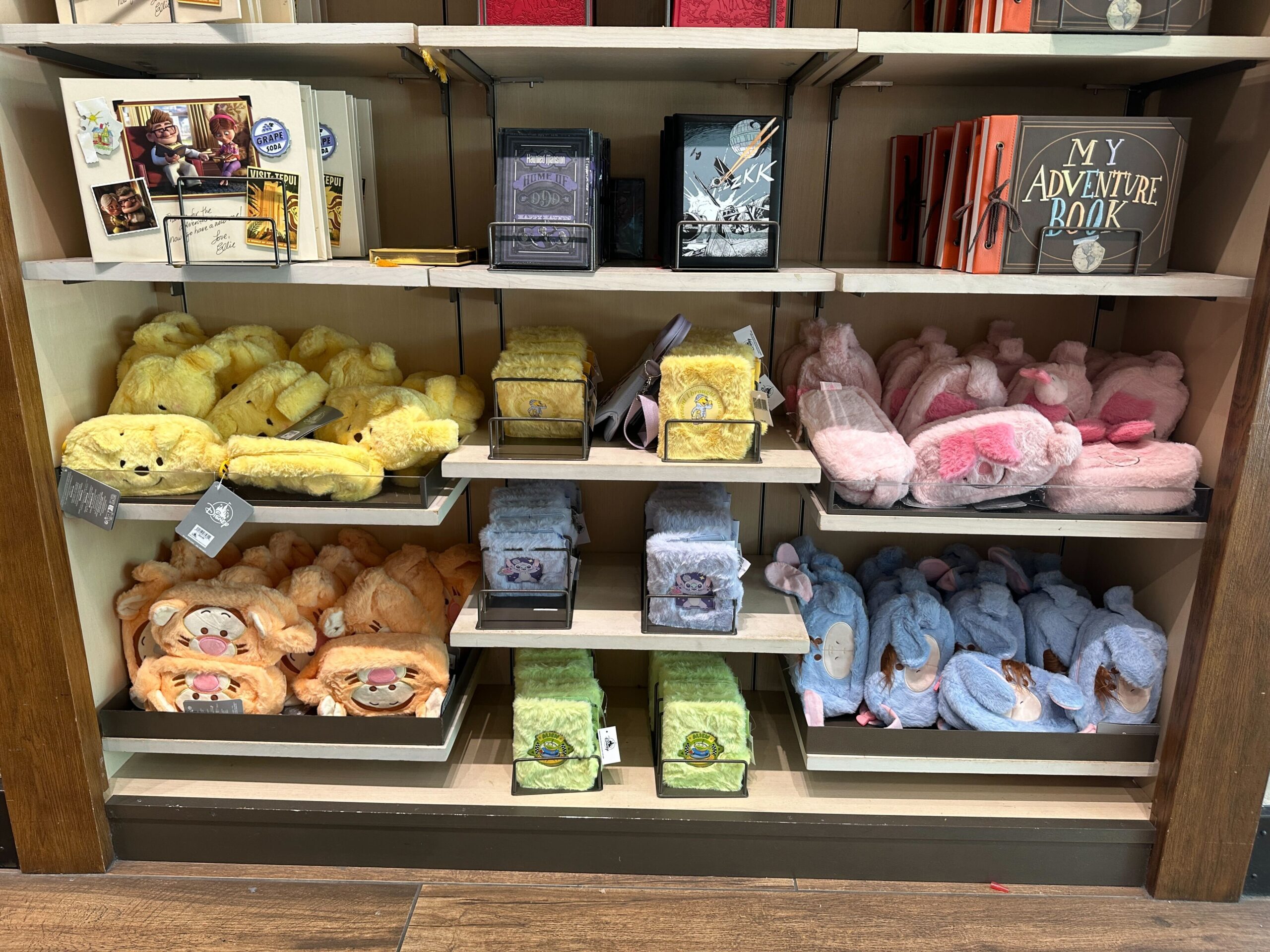 Fuzzy journals and zippered pouches at Disney Springs.