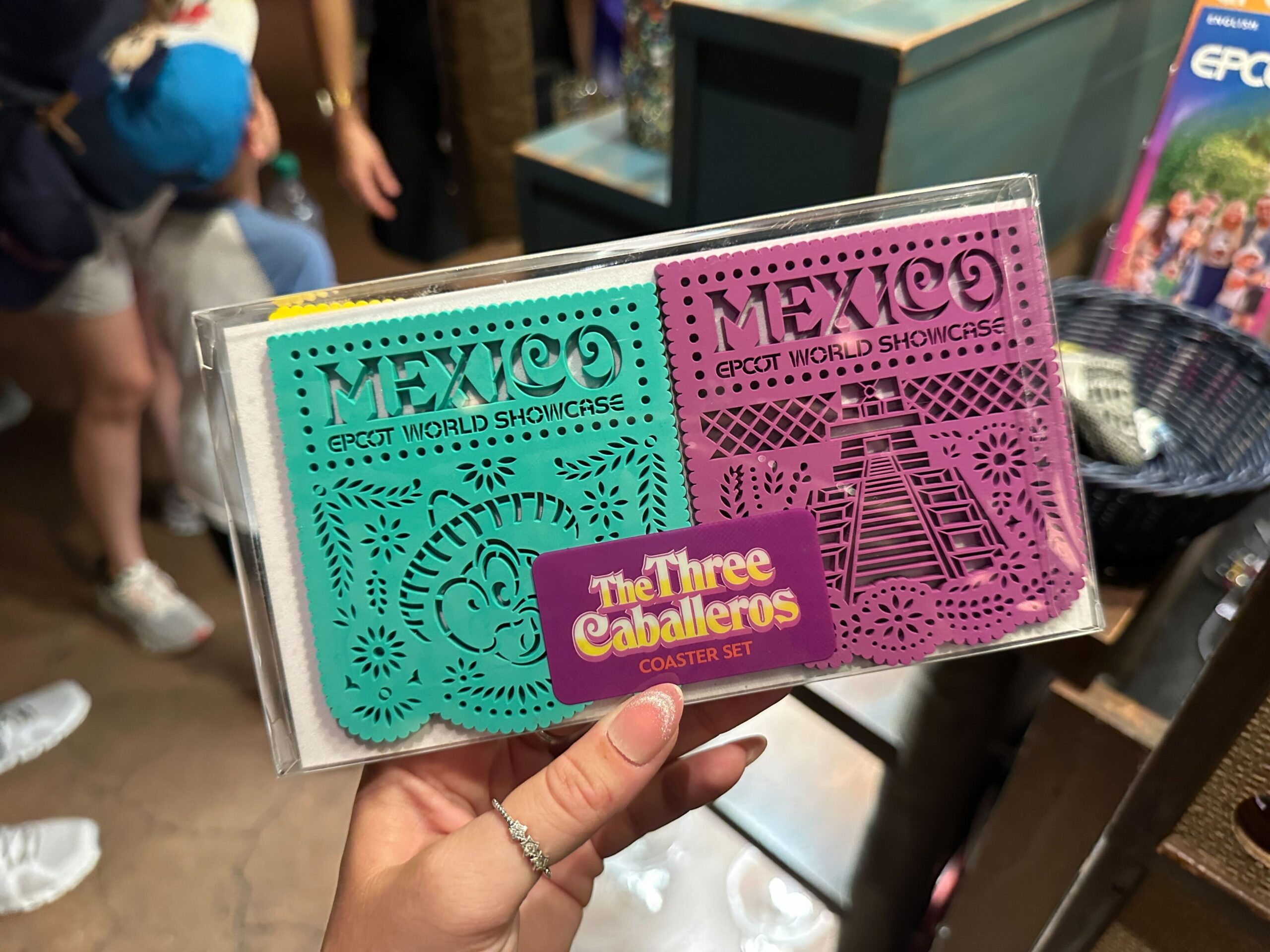 Two of four coasters in the Papel Picado Coaster Set.