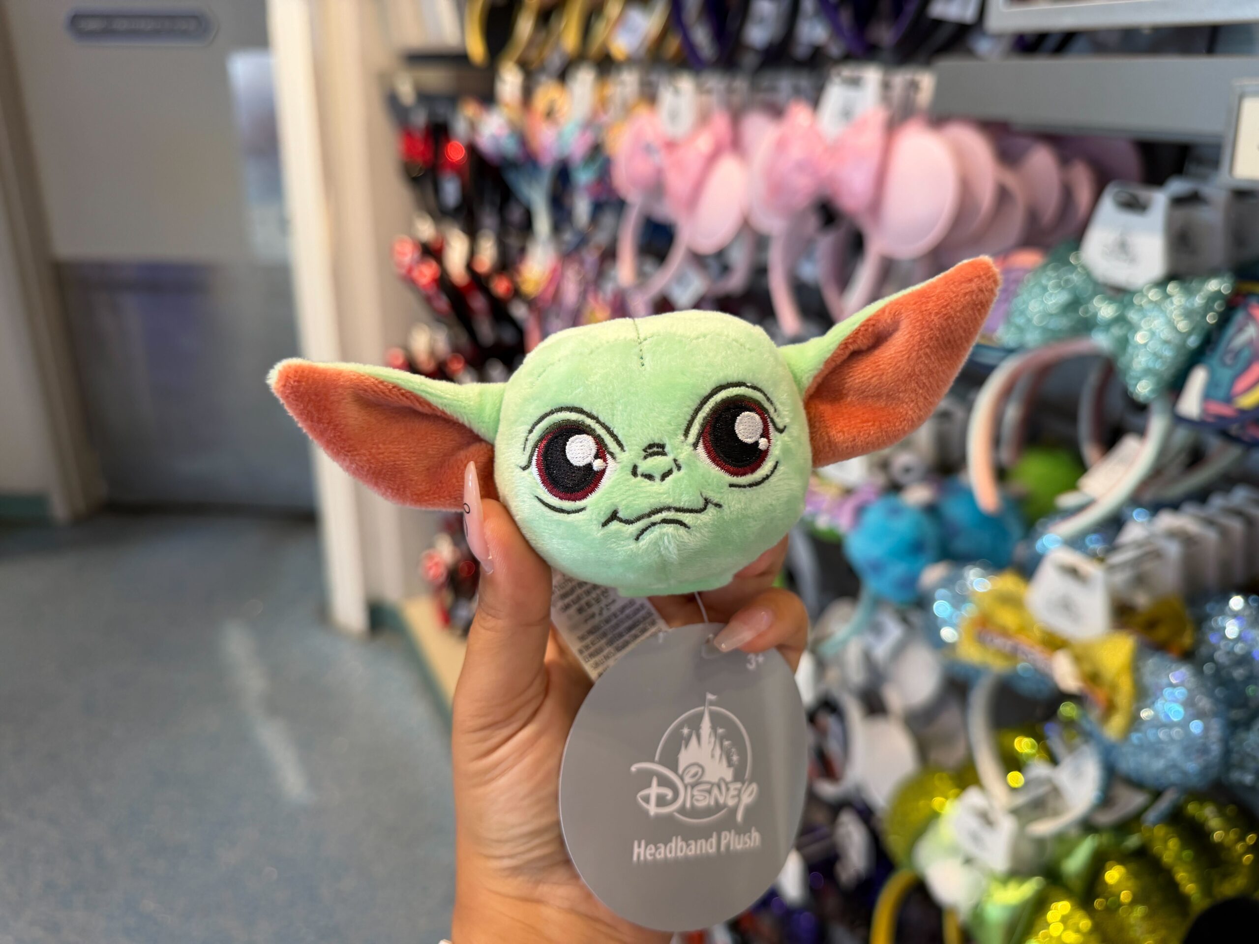 The Grogu headband plush has three-dimensional ears and embroidered features.