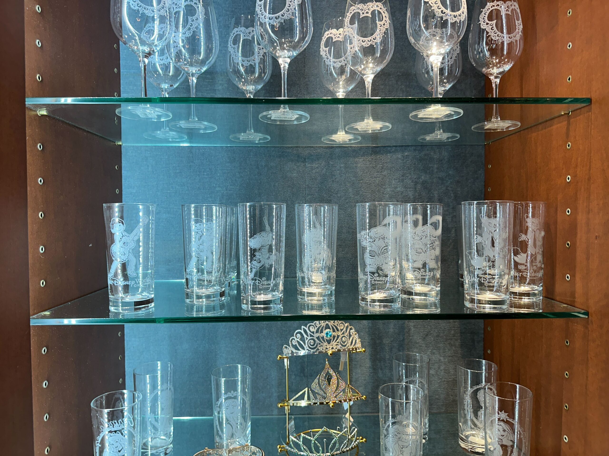 Crystal glasses featuring characters from Coco, Moana, and Zootopia now available at Walt Disney World.