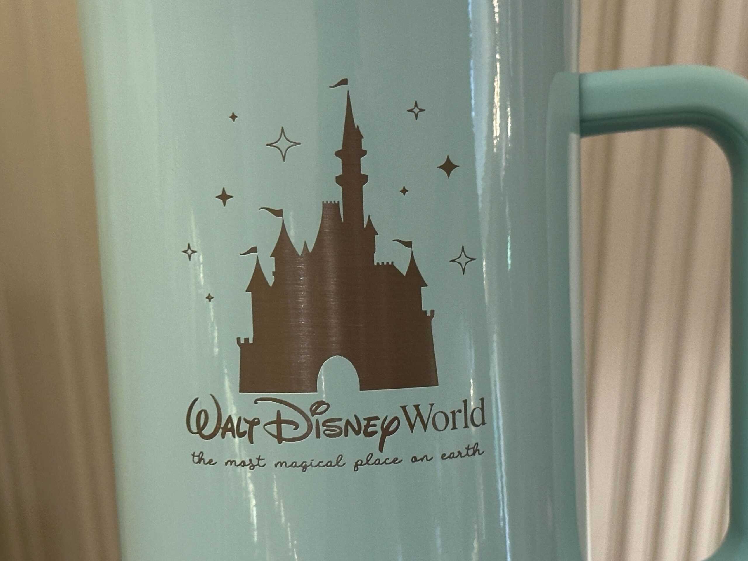 Close-up of front of Corkcicle Aqua Walt Disney World Tumbler.