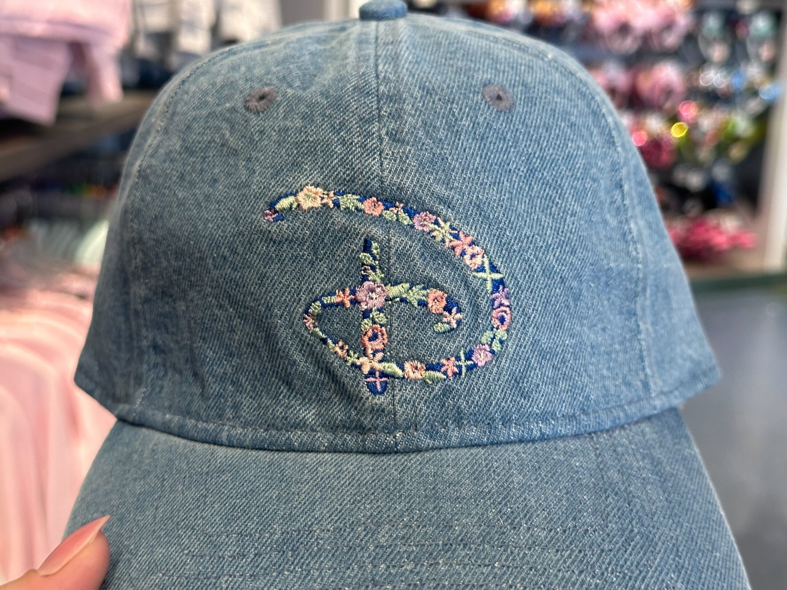 Close-up of front of Floral Disney 'D' Denim Hat.