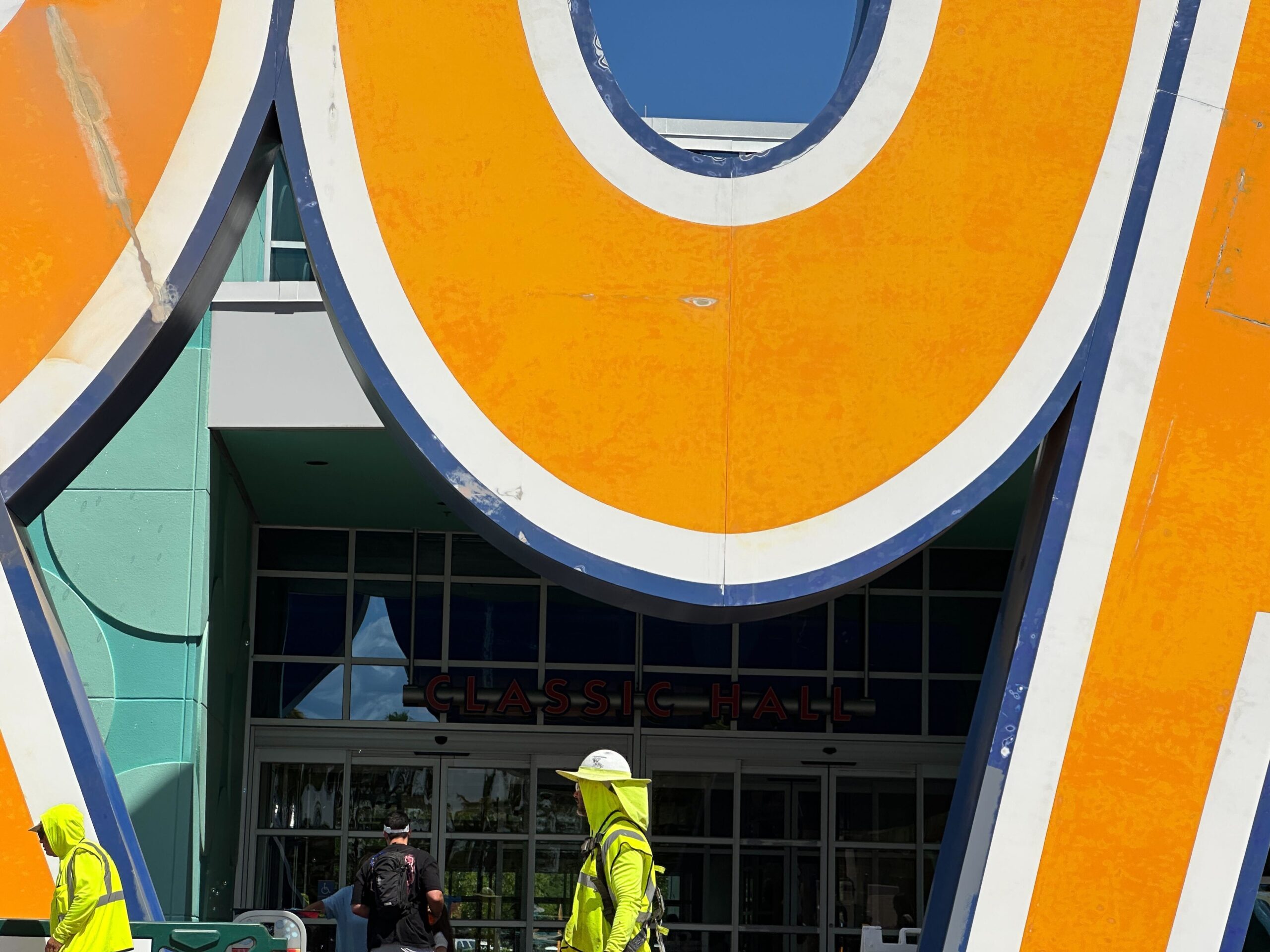 Crews have started a refurbishment of the giant "POP" sign outside Classic Hall at Disney's Pop Century Resort.