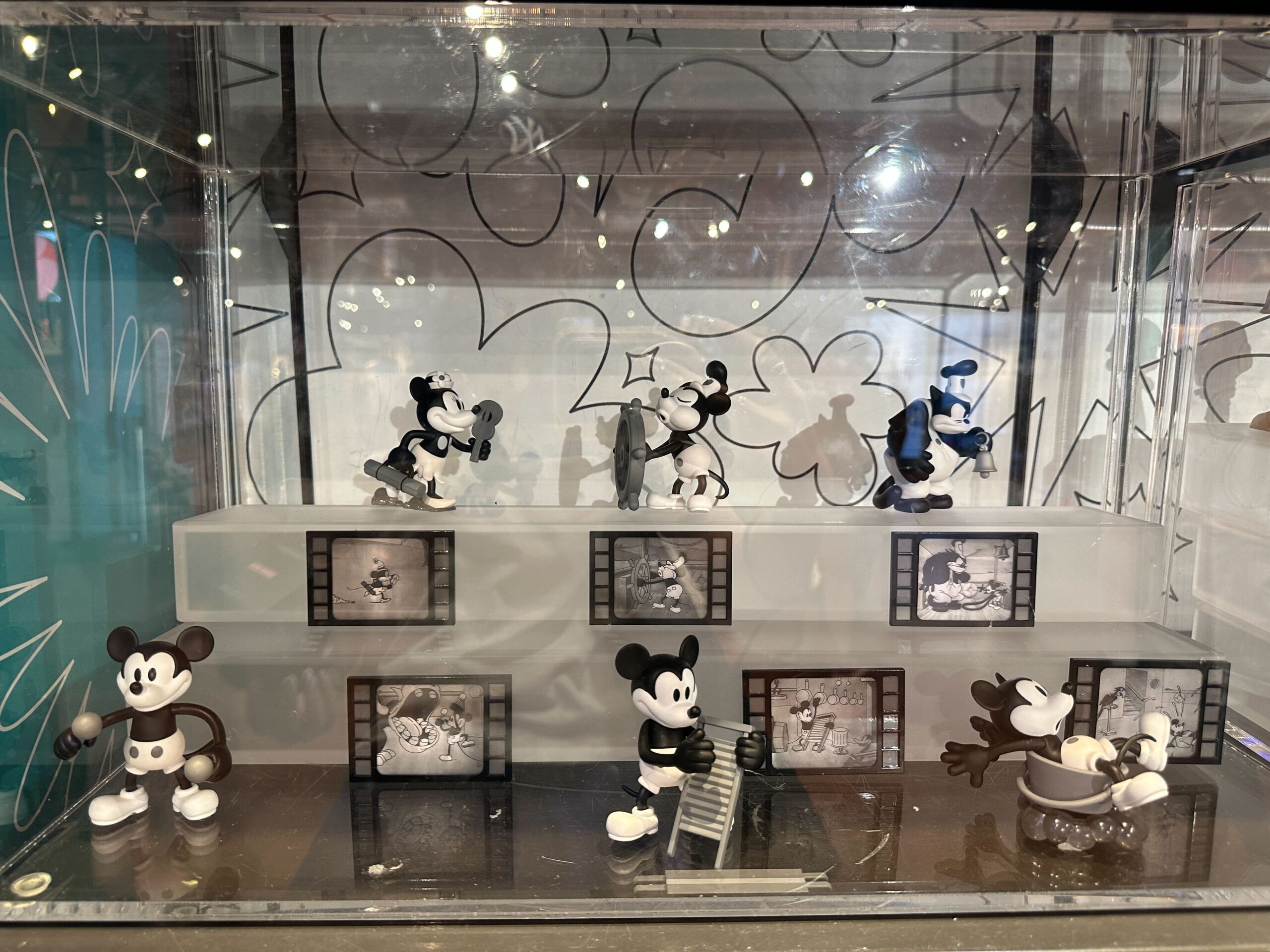 Sleepy Winnie the Pooh & 'Steamboat Willie' Mickey Mystery Figures