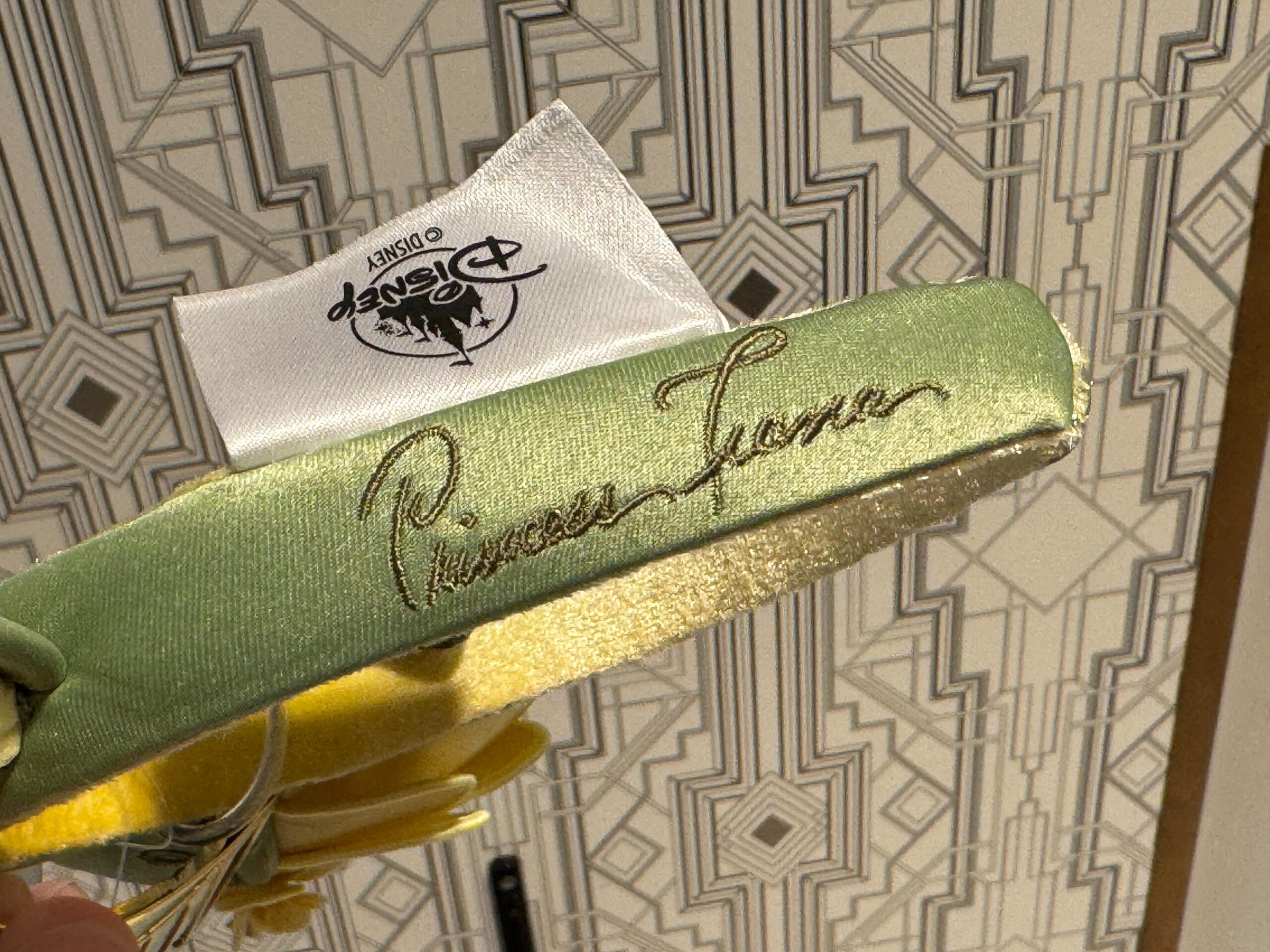 A new ear headband inspired by Princess Tiana's lily Pad dress from The Princess and the Frog has arrived at Walt Disney World.