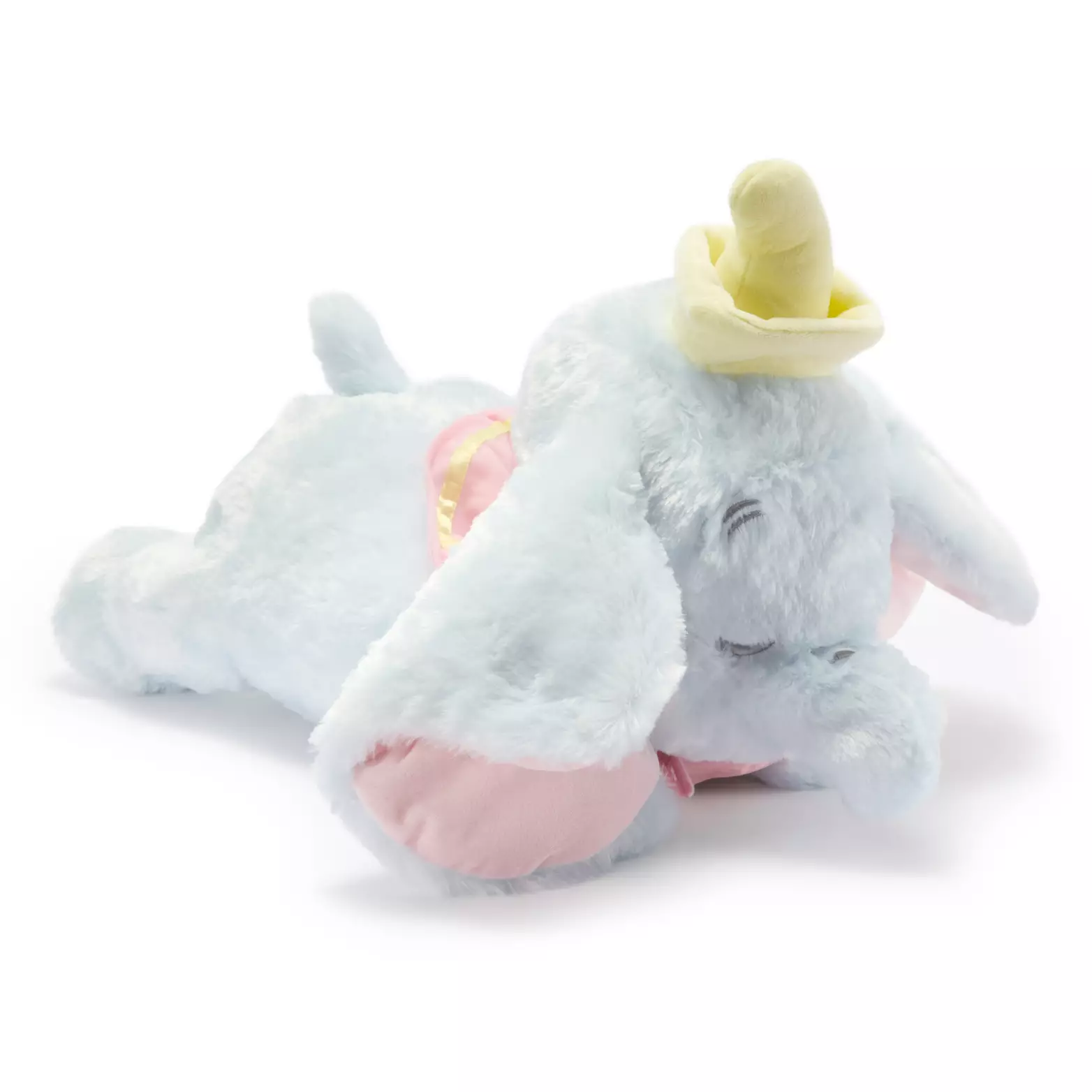 Like the Piglet plush, Dumbo is also shown lying on his belly. His ears are lowered, and his eyes are too, as if he is taking a nap. Dumbo is made of soft, light blue plush and has a pink and yellow fabric circus collar around his neck.