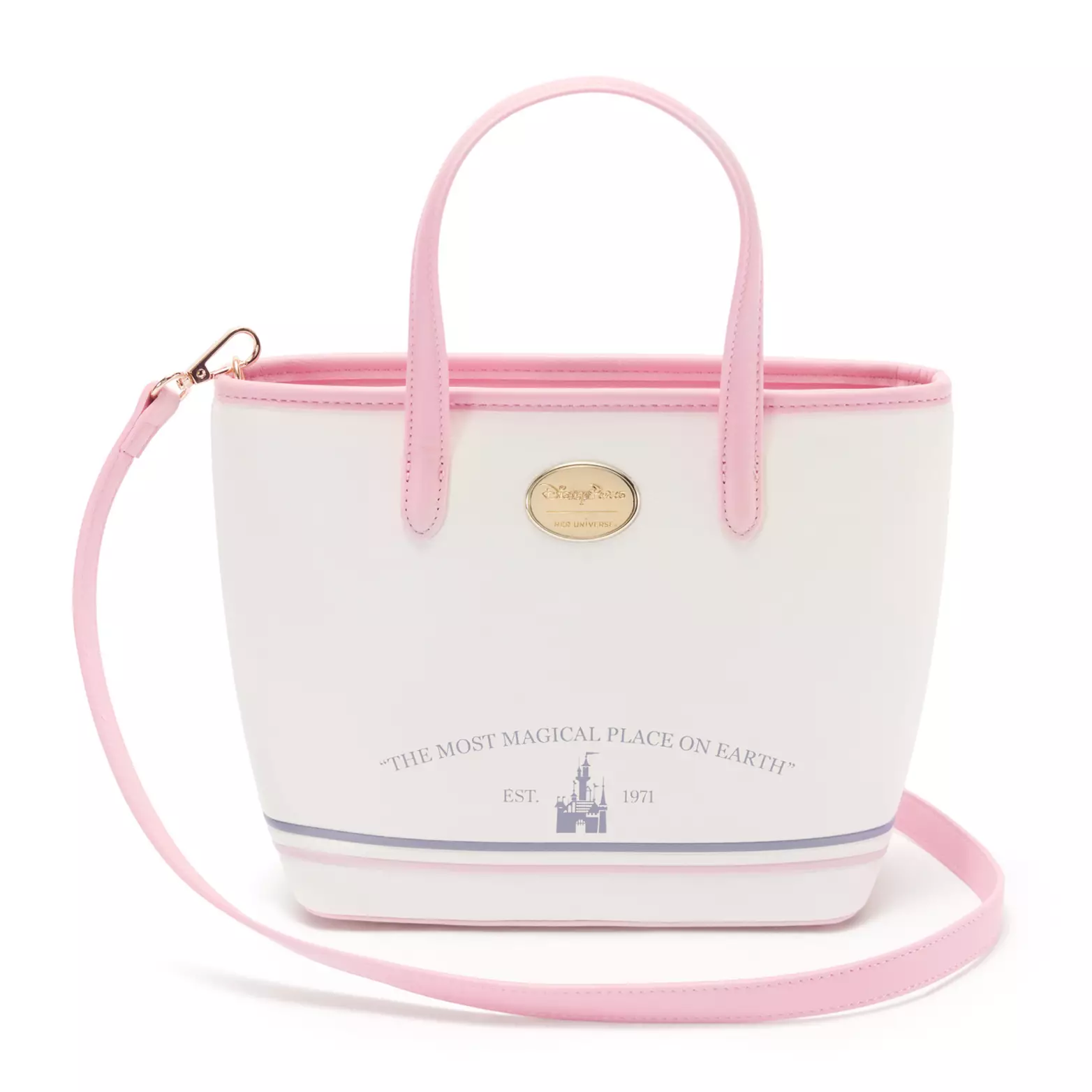 On the back, a shiny gold emblem is at the top of the bag. Beneath is again the phrase "The Most Magical Place on Earth" in lavender above Cinderella Castle and "Est. 1971" in the same tone. Lavender and pink lines surround the bottom of the bag.