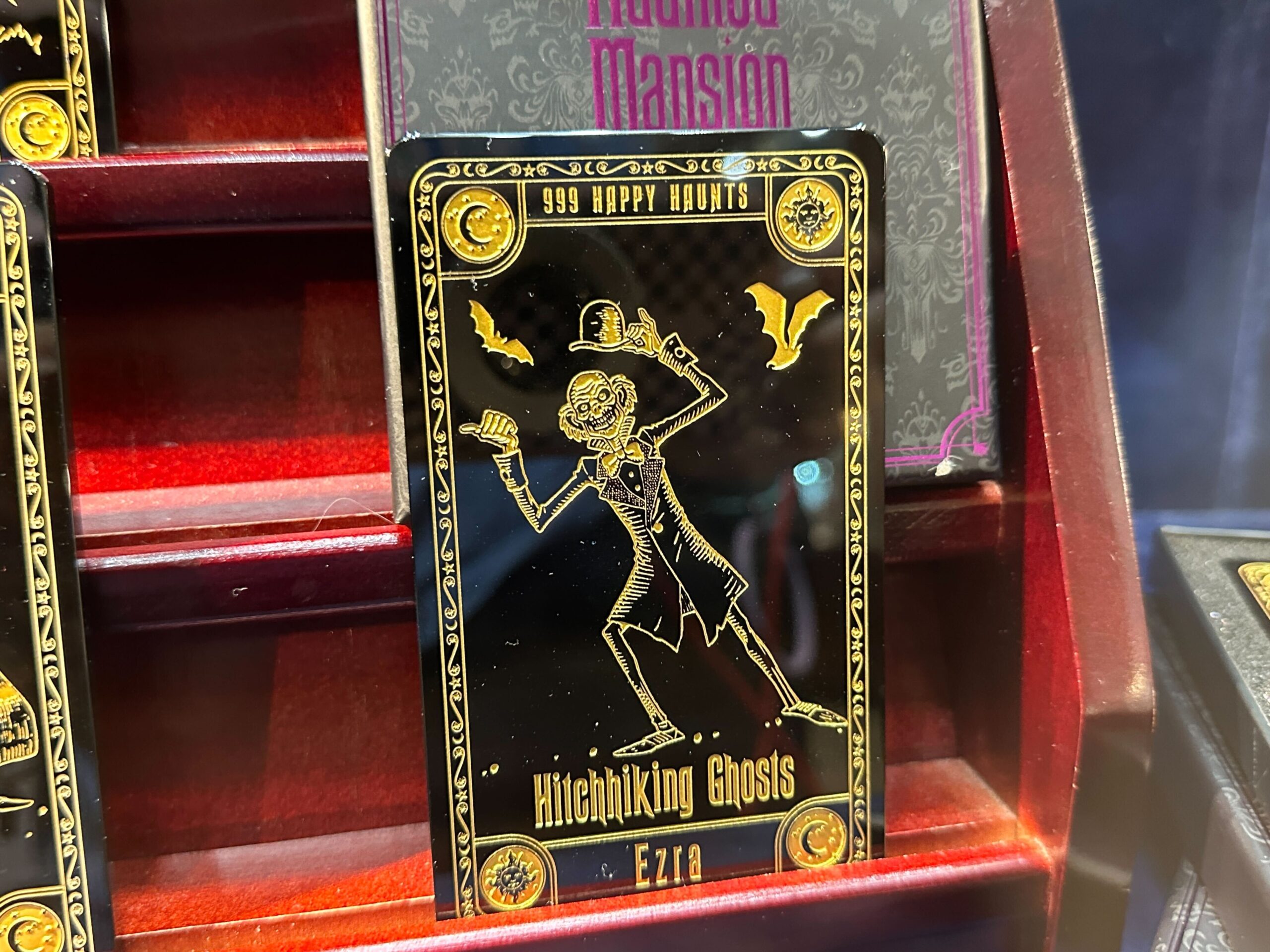 Haunted Mansion collector card sets featuring Ezra the Hitchhiking Ghost are now available at Walt Disney World.