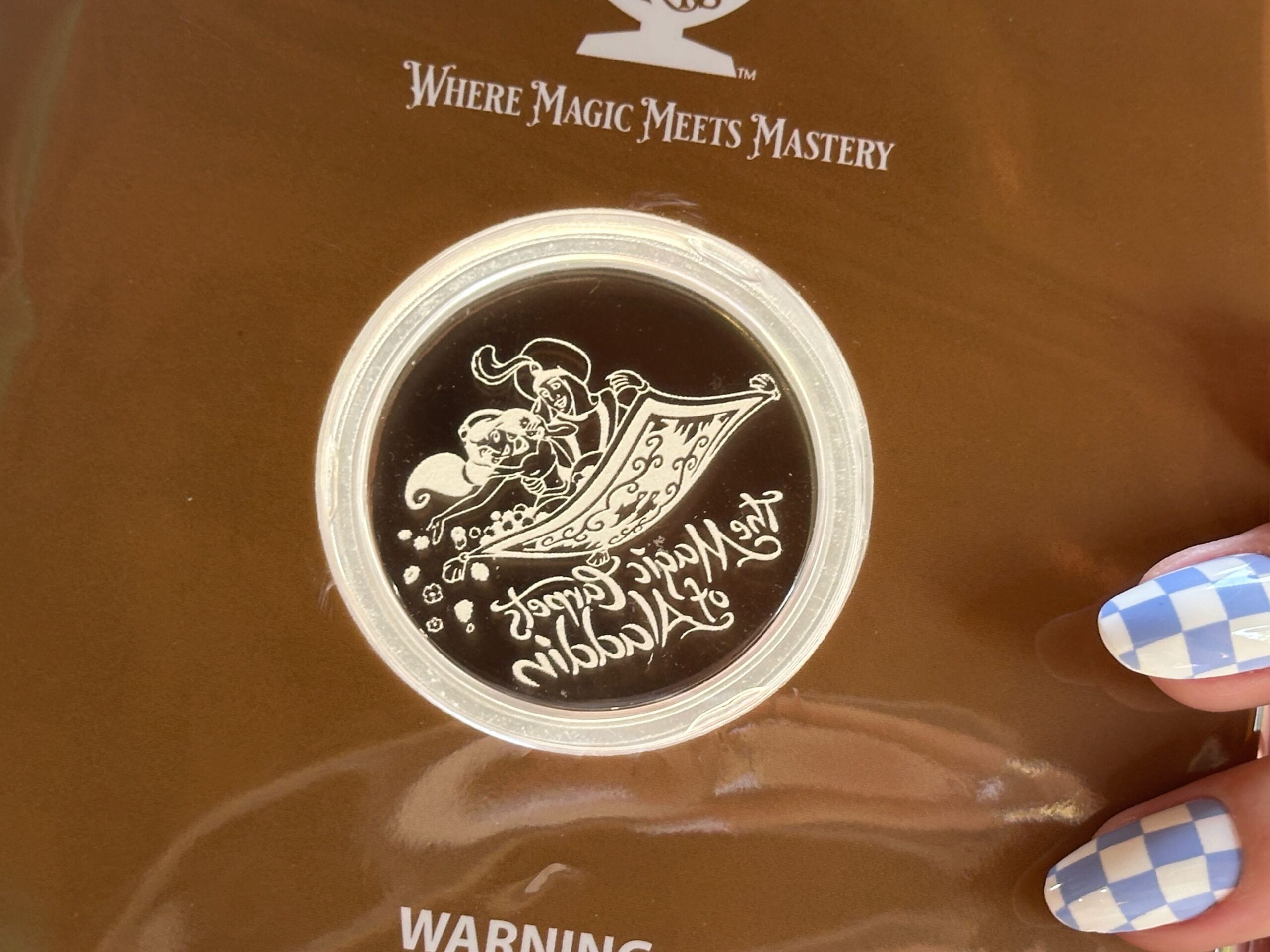 The Magic Carpets of Aladdin Collectible Glass Coin - $29