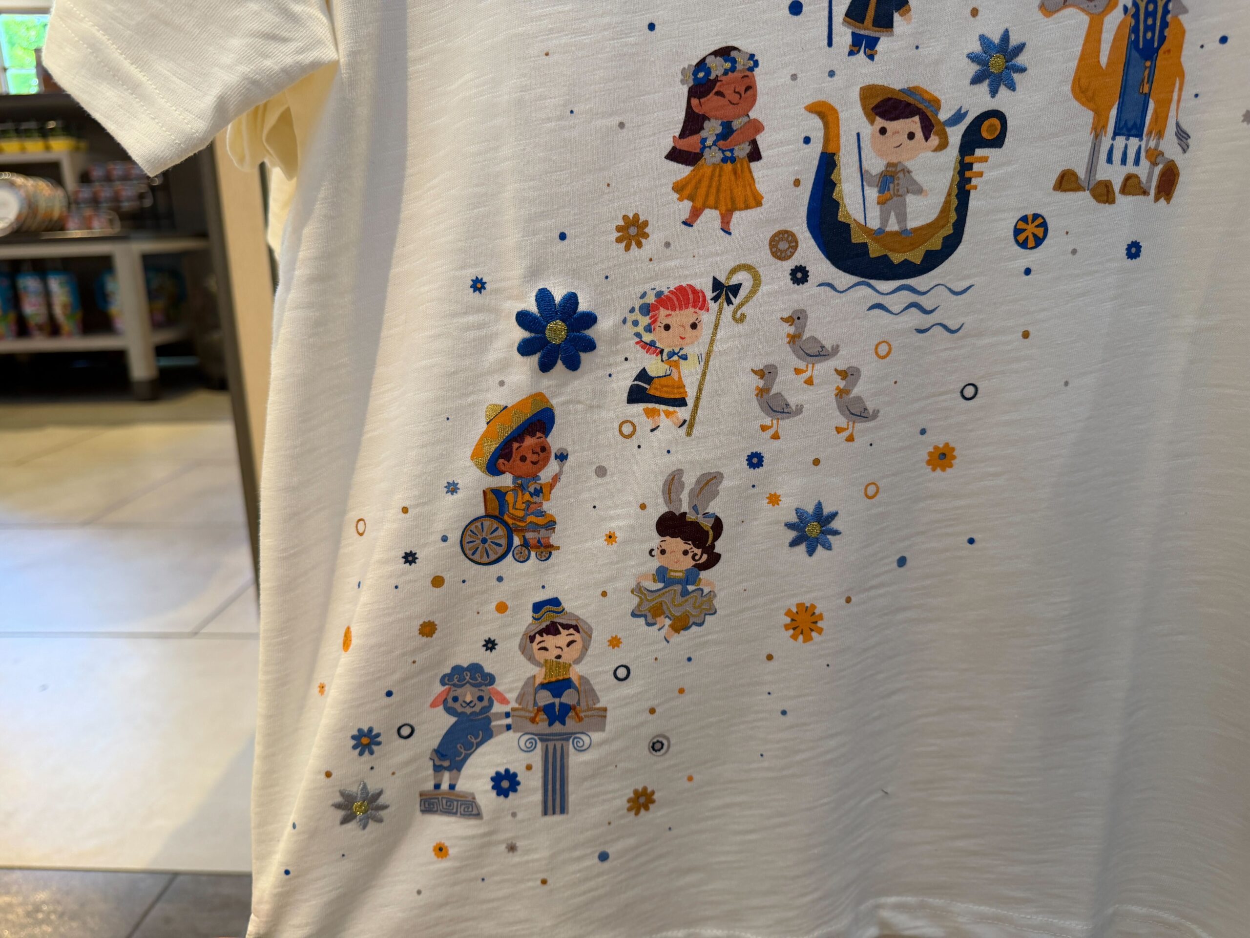 'it's a Small World' 60th Anniversary Merchandise Collection Sails Into Disneyland