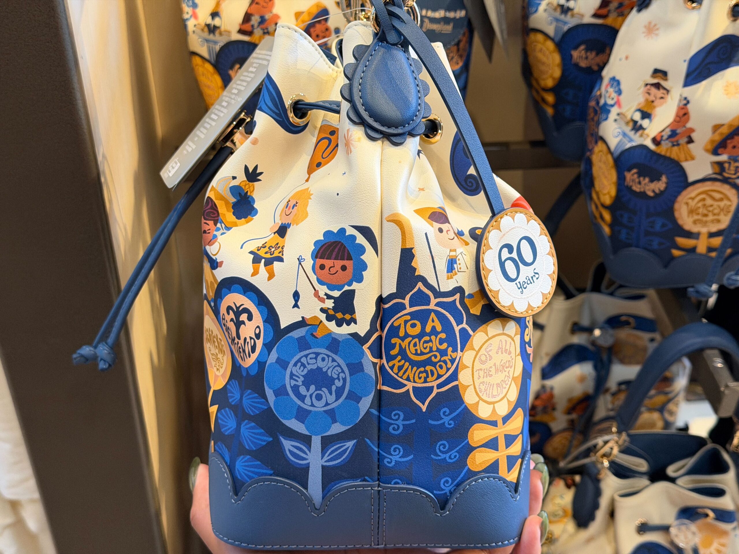 'it's a Small World' 60th Anniversary Merchandise Collection Sails Into Disneyland