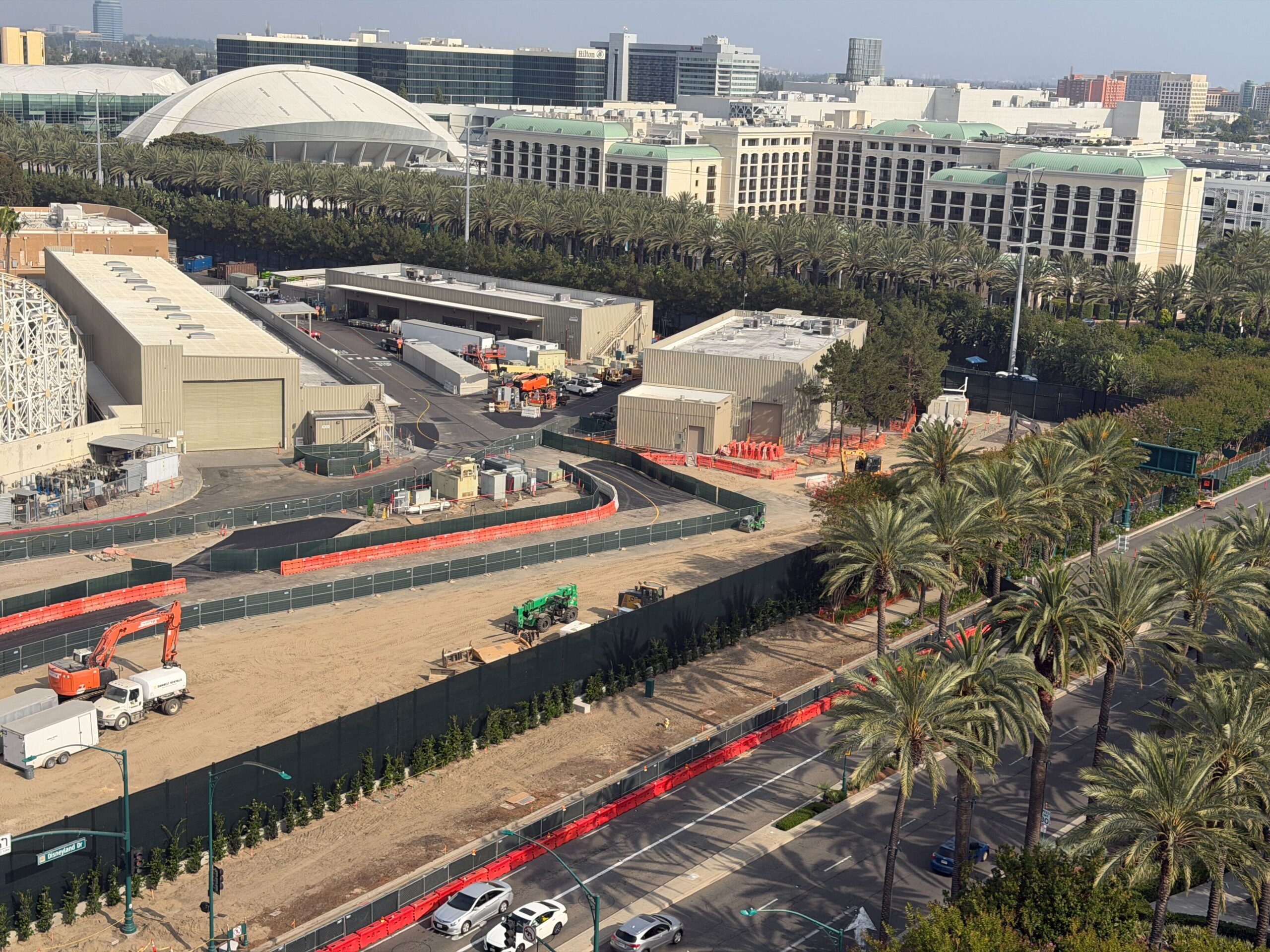 Construction continues to ramp up on the future Coco-inspired attraction, including a newly paved roadway visible from Pixar Place Hotel.