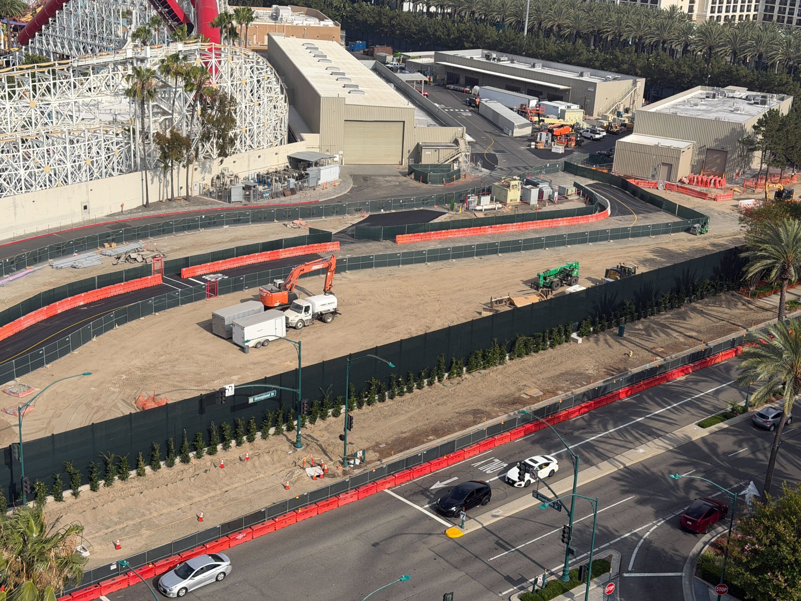 Construction continues to ramp up on the future Coco-inspired attraction, including a newly paved roadway visible from Pixar Place Hotel.
