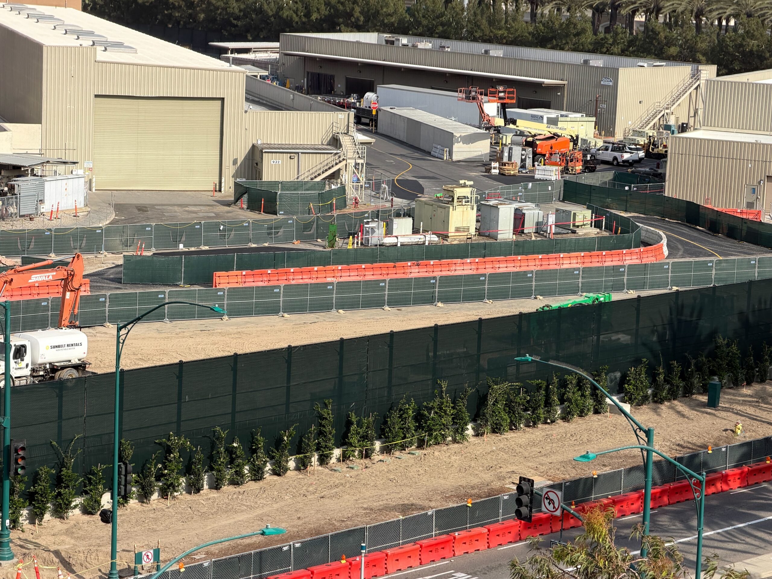 Construction continues to ramp up on the future Coco-inspired attraction, including a newly paved roadway visible from Pixar Place Hotel.