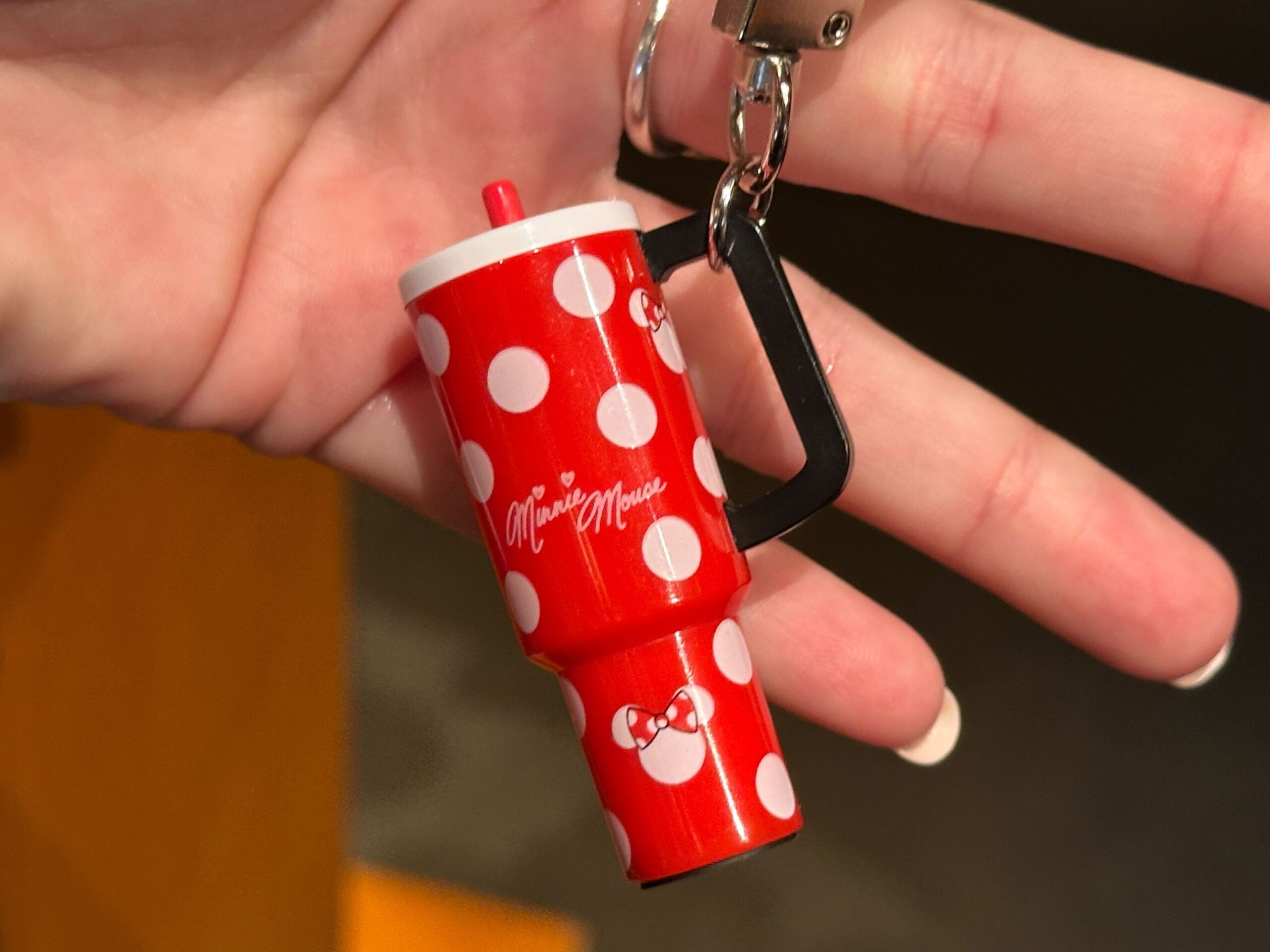 The small charms are designed to resemble the explosively popular 40oz tumblers from recent years. They hang from silver-tone key rings and lobster clasps, making them easy to attach to a bag, backpack, lanyard, or set of keys.