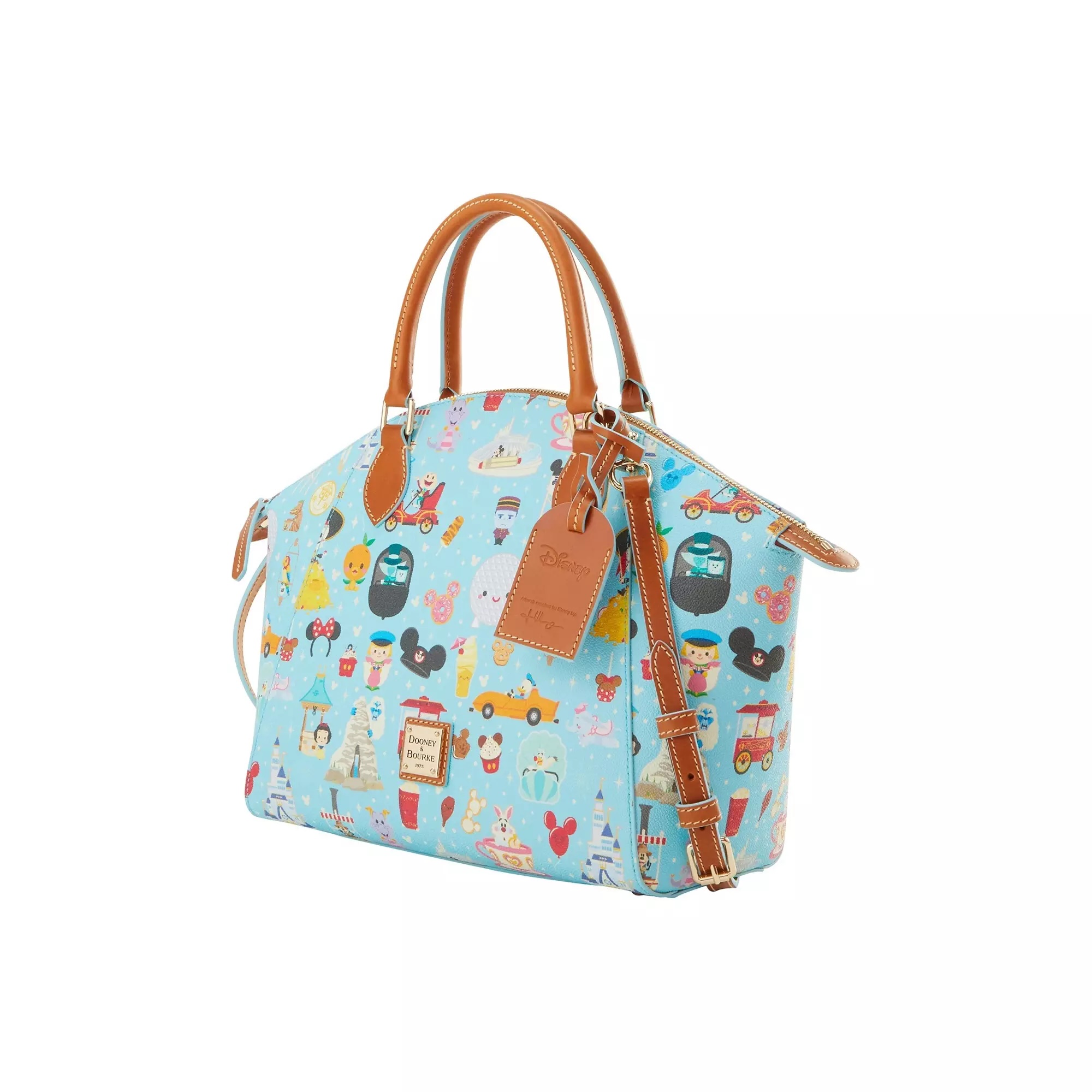 Maruyama's distinctive cute style brings to life various Disney Parks icons and characters against a blue background on both the satchel and wallet. Featured imagery from both coasts includes Spaceship Earth, a castle, the White Rabbit in a Mad Tea Party cup, Mr. Toad in his red car, Donald driving an Autopia car, Figment, Mickey balloons, Snow White and her wishing well, a Mickey donut, a turkey leg, Mickey Mouse Ice Cream Bar, pineapple swirl, and the Yeti with the Matterhorn.