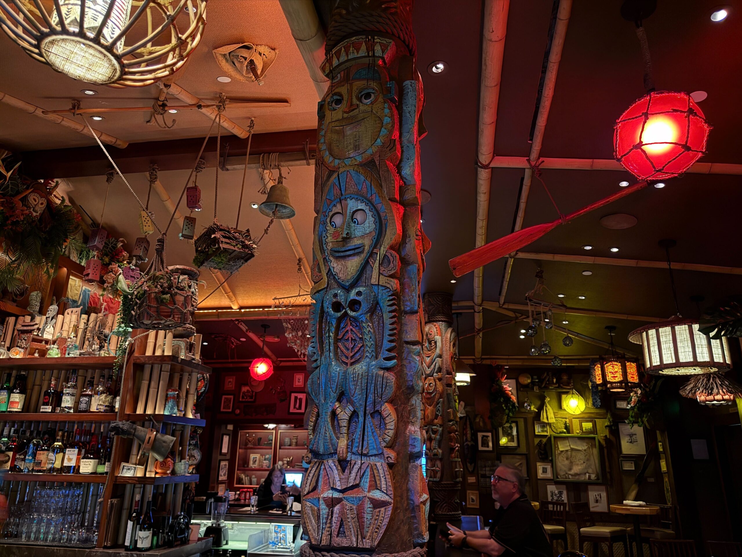 Disneyland Hotel Trader Sam's tiki bar totem poles.