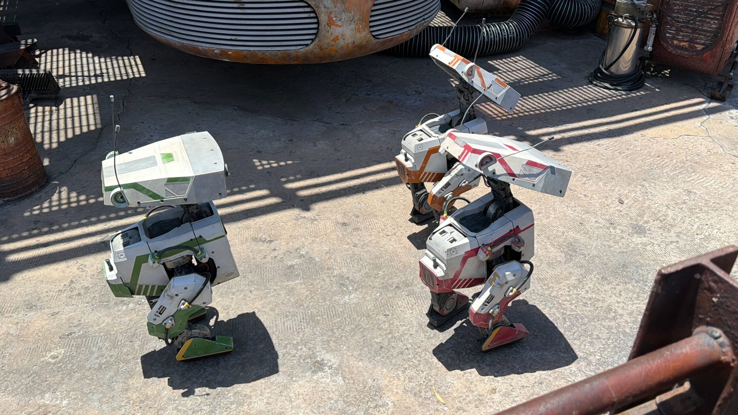 Side profile views of Grek, Oskar, and Red.