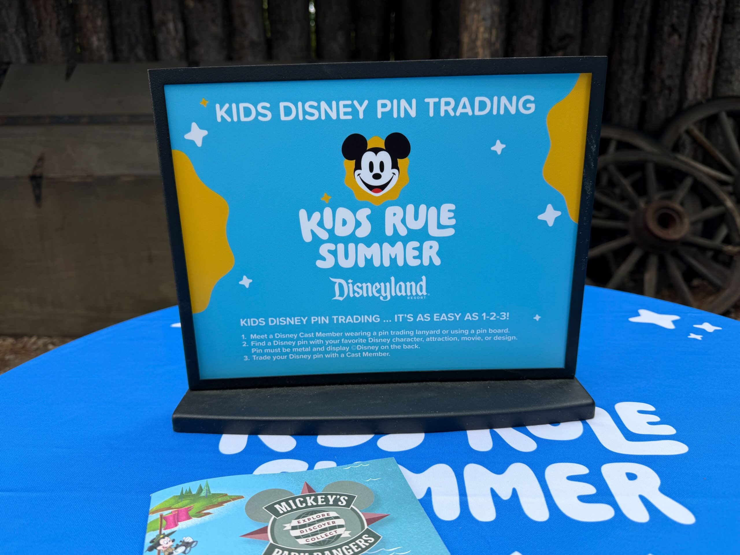 Disneyland has opened a kids-exclusive pin trading area near Westward Ho Trading Company. The space has often been used by pin traders but for the summer, Disney is reserving it for kids.