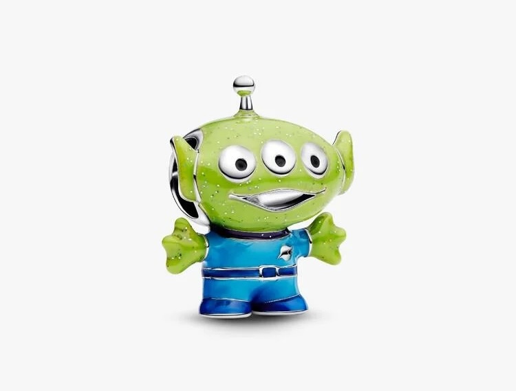 This enamel and sterling silver charm depicts a green alien wearing his blue spacesuit. He has sparkly details.