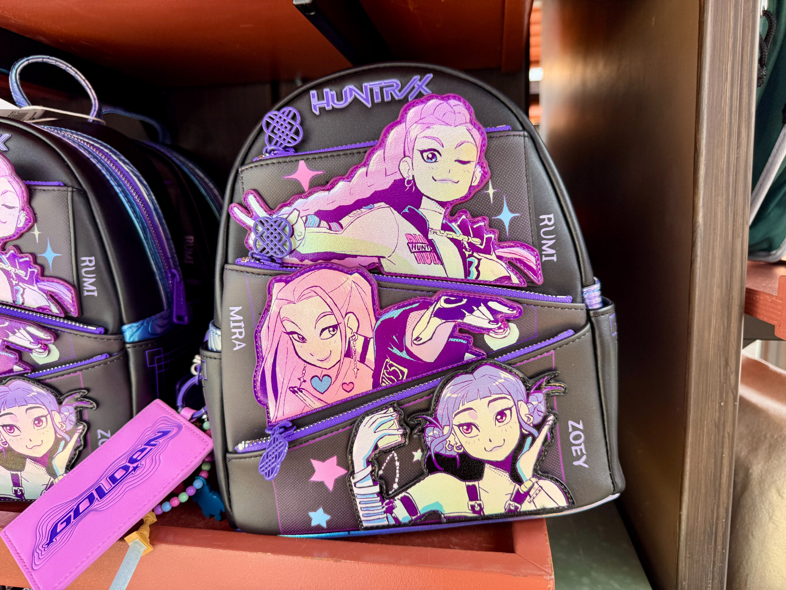 Front of Huntrix Loungefly Backpack.