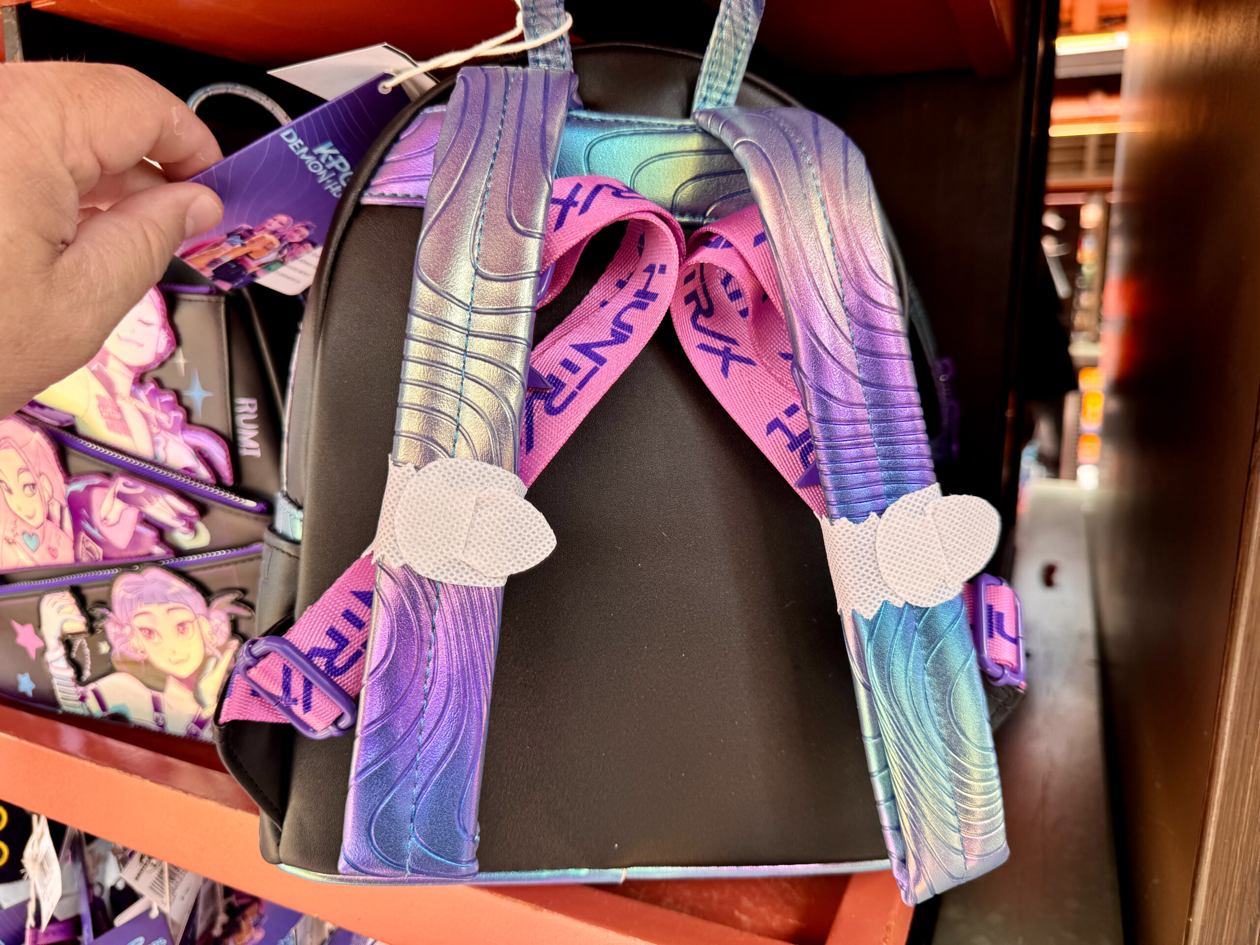 Back of Huntrix Loungefly Backpack.
