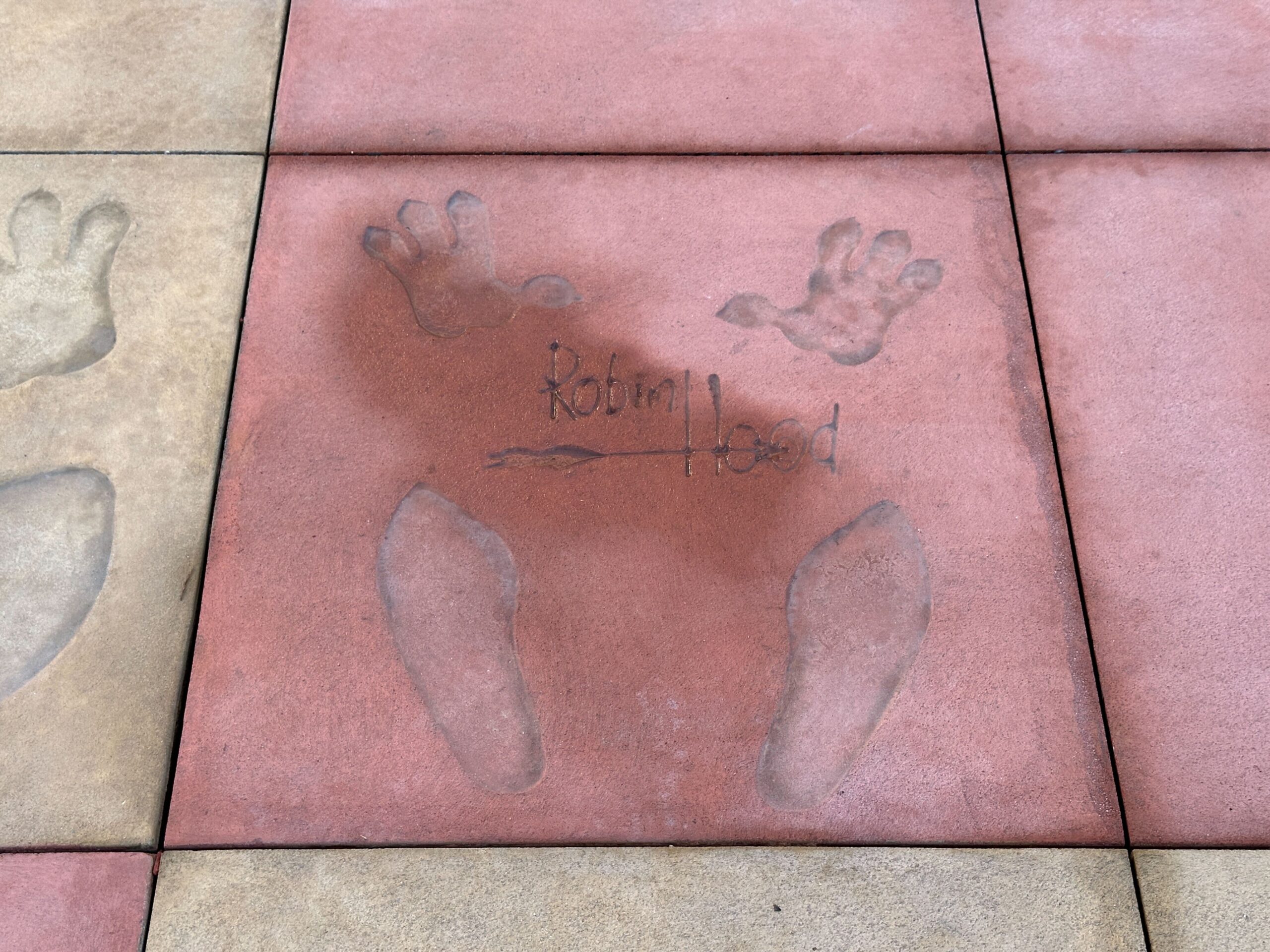 Pavement near The Magic of Disney Animation features character autographs and handprints. Again, many characters across several of Disney's most beloved films are represented here.