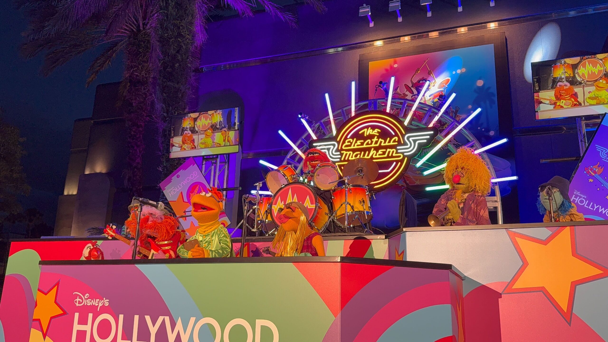 The Electric Mayhem & John Stamos Open Rock 'n' Roller Coaster Starring The Muppets