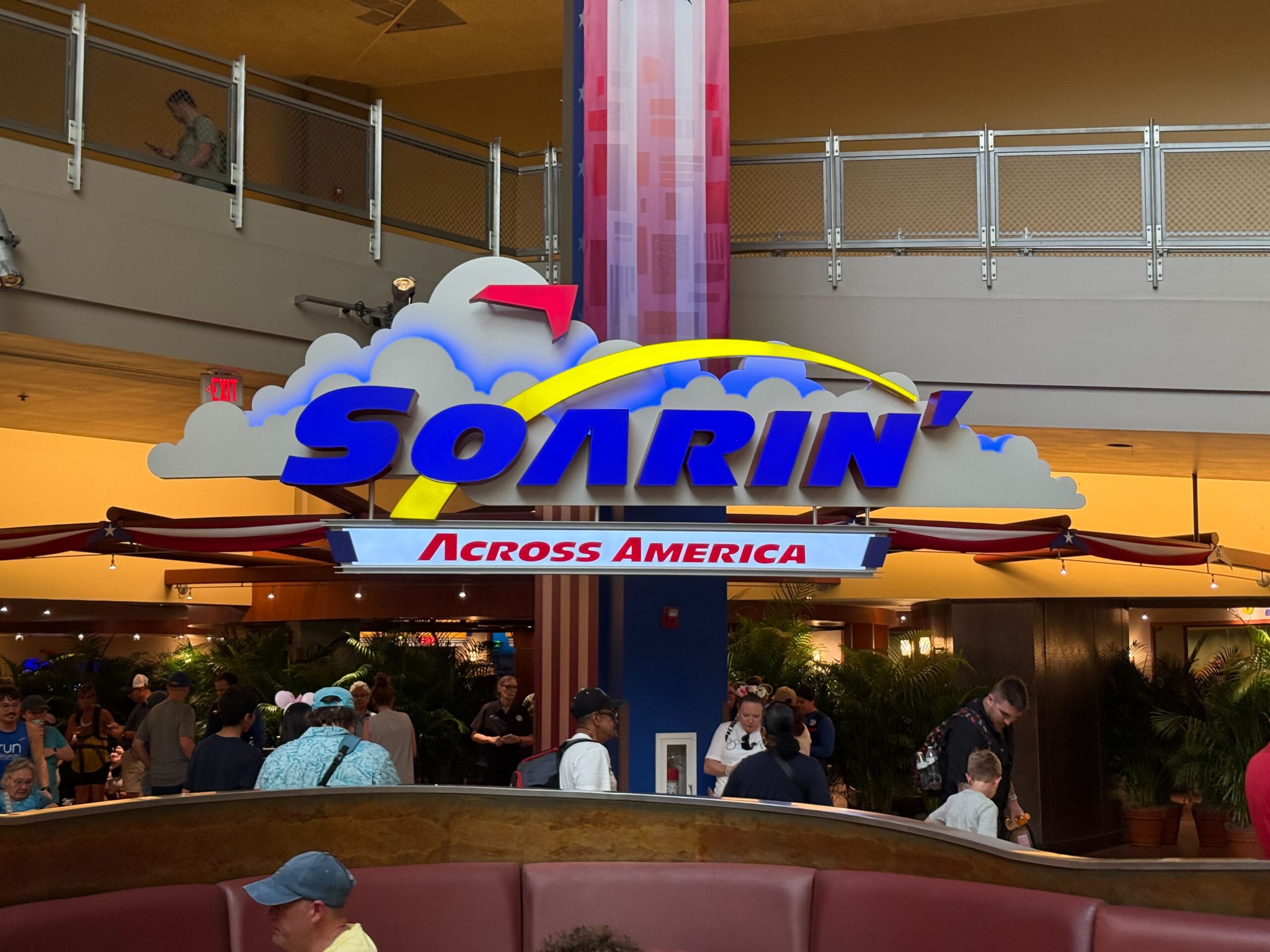 The Soarin' entrance in The Land pavilion of EPCOT now has the Soarin' Across America marquee in addition to the American flag-inspired decorations.