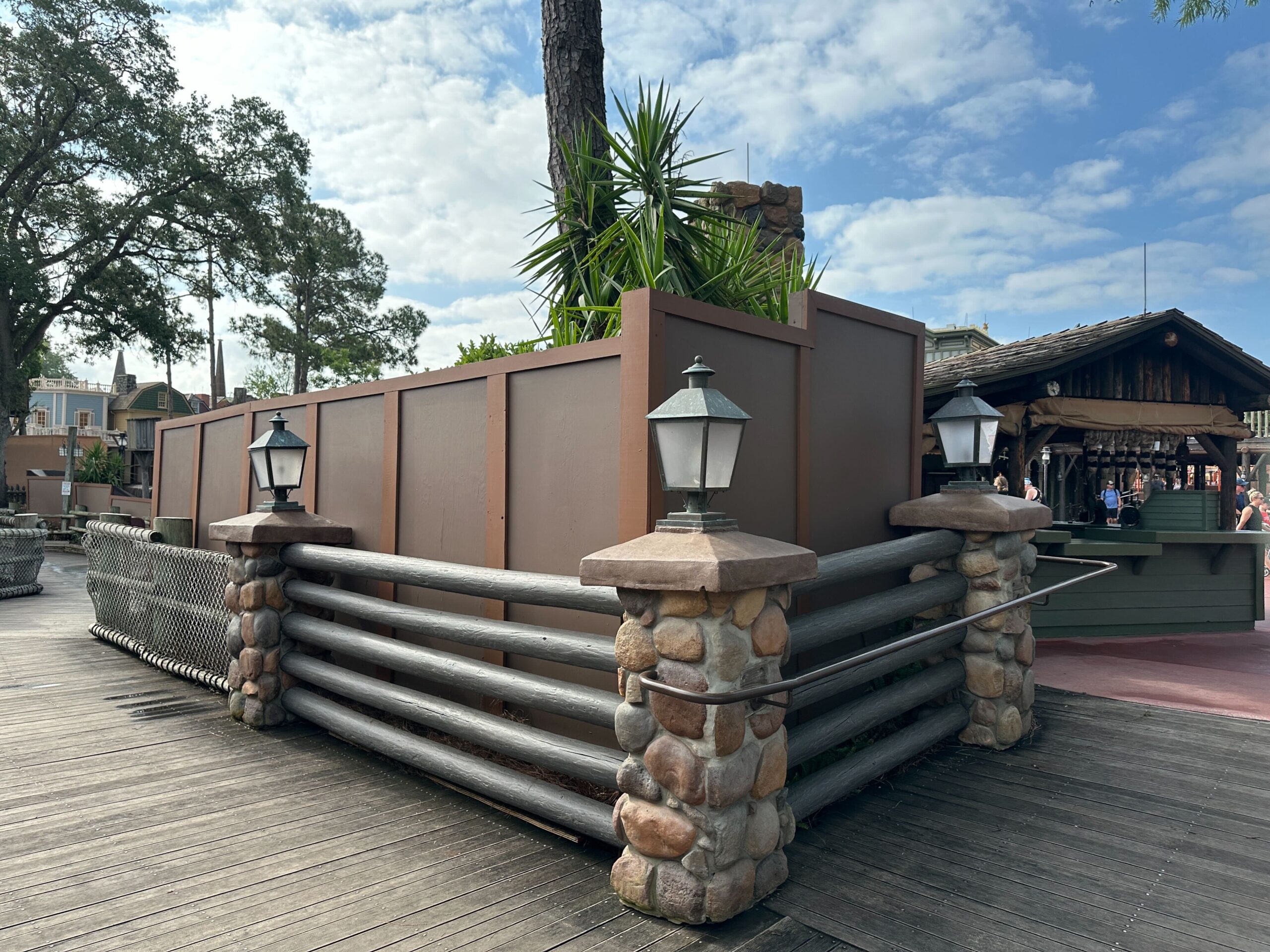 Construction walls and scrims now run behind Big Al's, which is expected to close permanently this weekend.