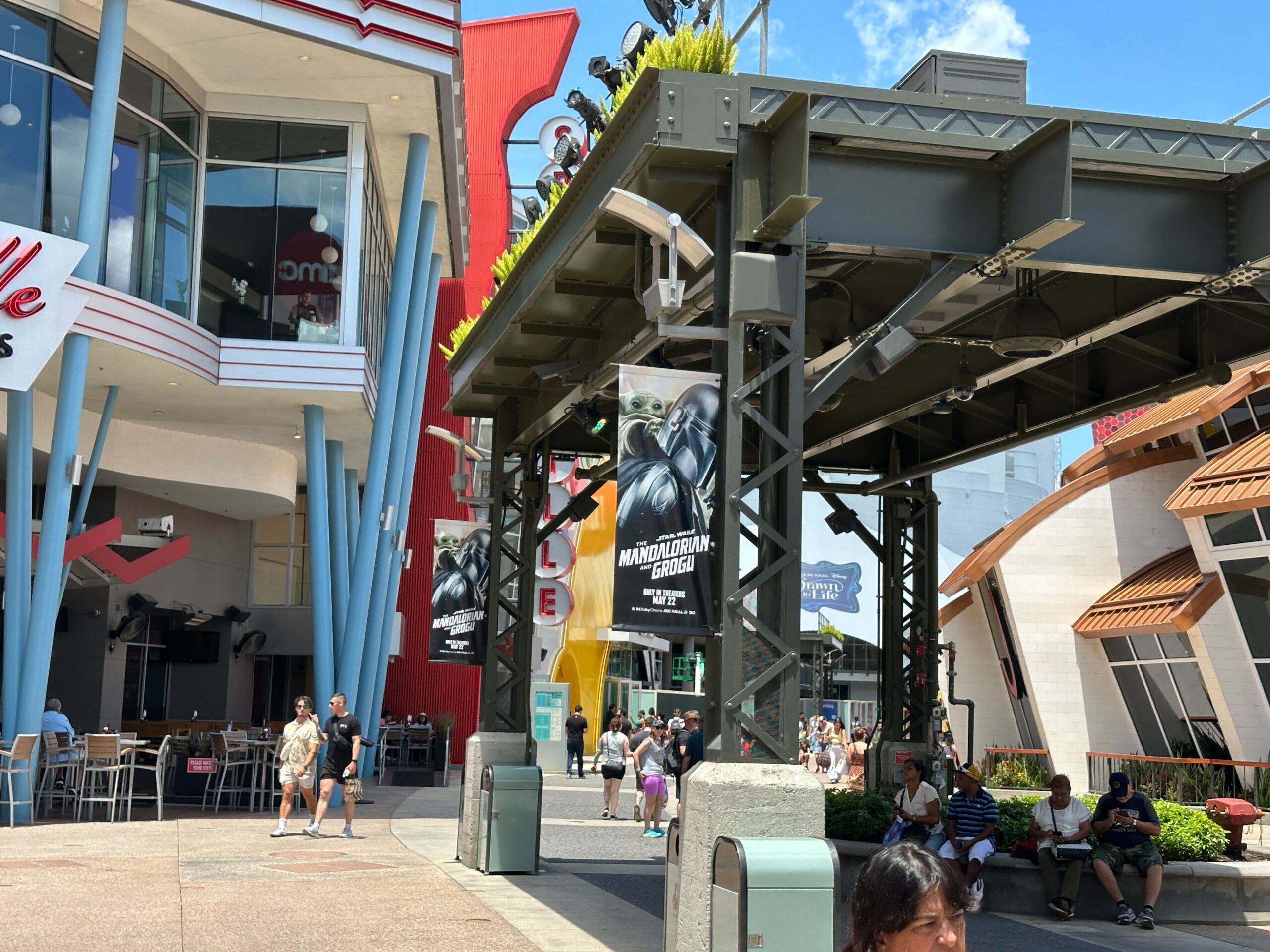 AMC Disney Springs 24 is now decked out with billboards, banners, and more celebrating The Mandalorian and Grogu.