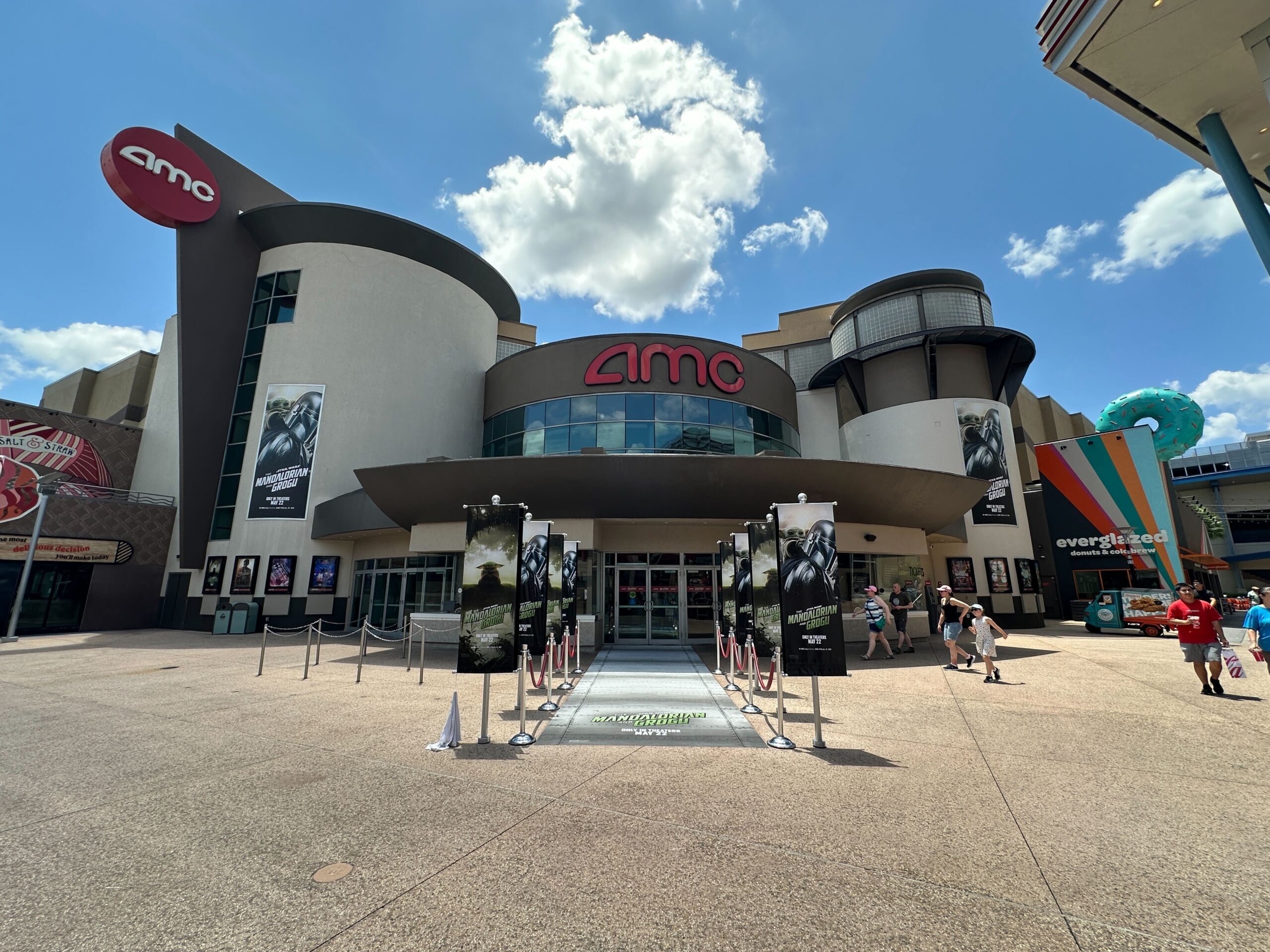 AMC Disney Springs 24 is now decked out with billboards, banners, and more celebrating The Mandalorian and Grogu.