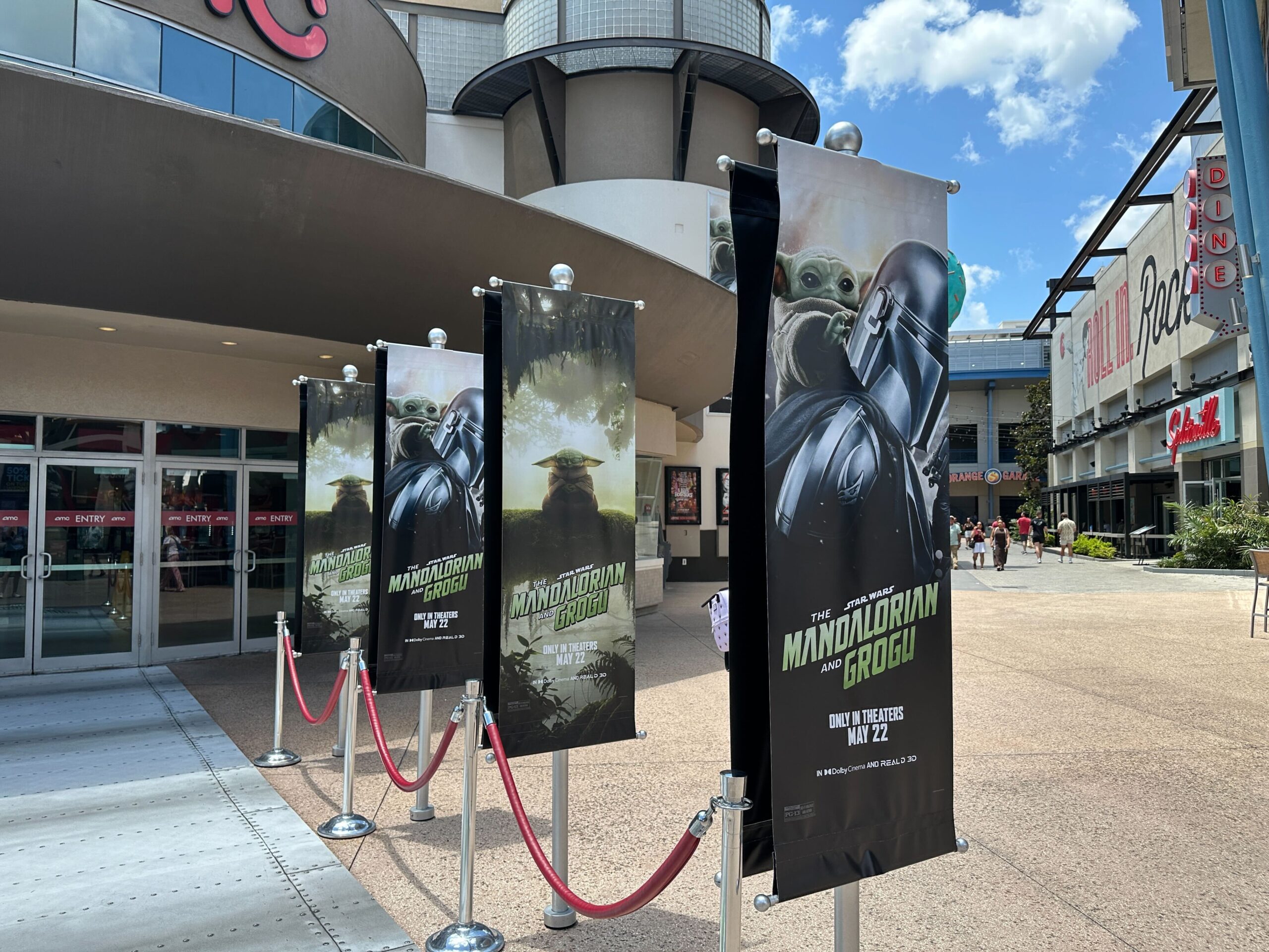 AMC Disney Springs 24 is now decked out with billboards, banners, and more celebrating The Mandalorian and Grogu.