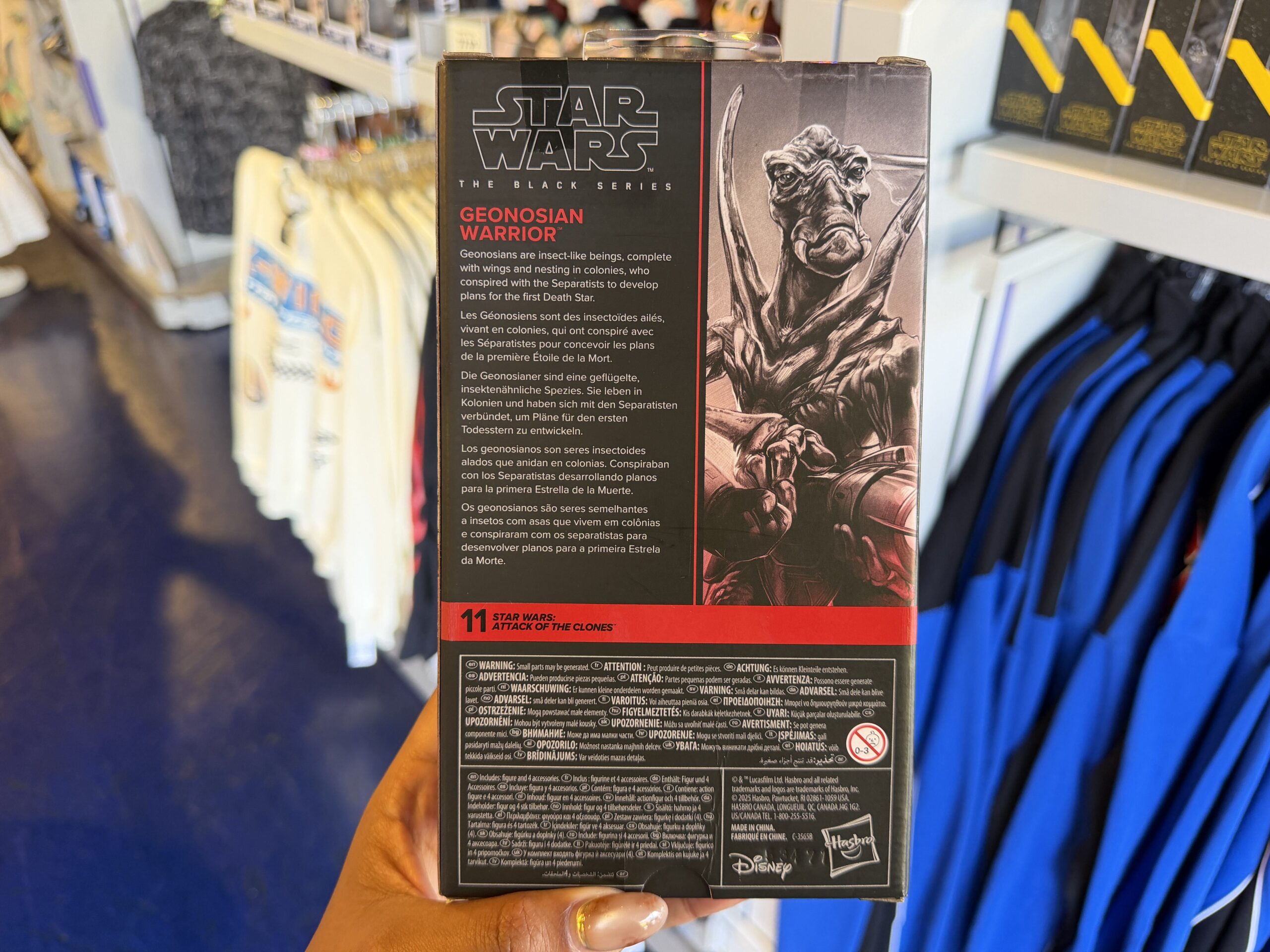 A new wave of Star Wars merchandise has arrived at Disneyland, including several graphic T-shirts, a keychain, and multiple Hasbro Black Series figures inspired by Star Wars: Attack of the Clones, The Mandalorian & Grogu, Star Tours, and more.