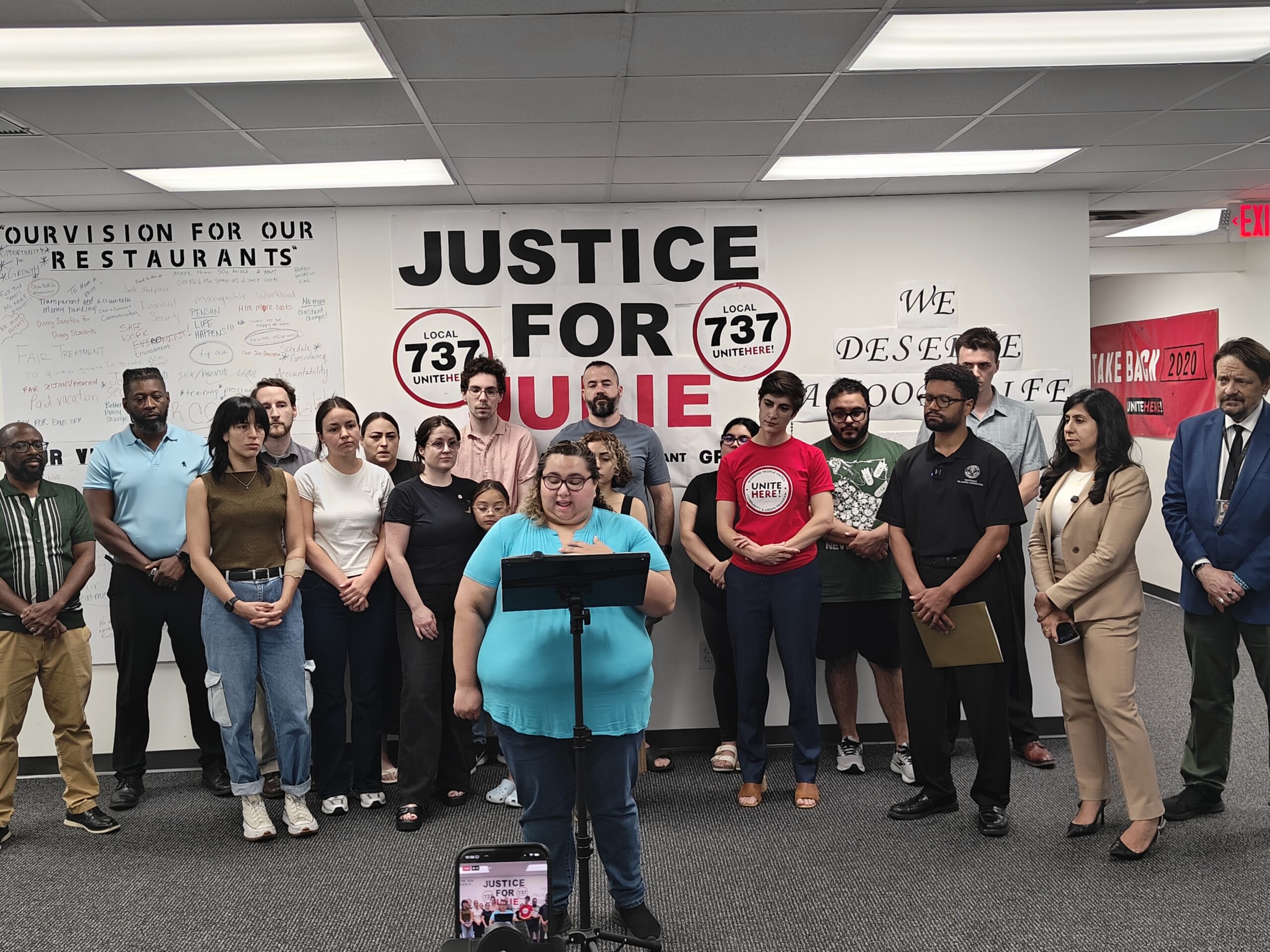 Patina employees LaQuita Huguely, Ismael Gonzalez, Berenice Rodriguez, and Jennifer Quiñones were joined by Congressman Maxwell Frost and State Representative Anna Eskamani at a UNITE HERE Local 737 press conference on Wednesday, June 17.
