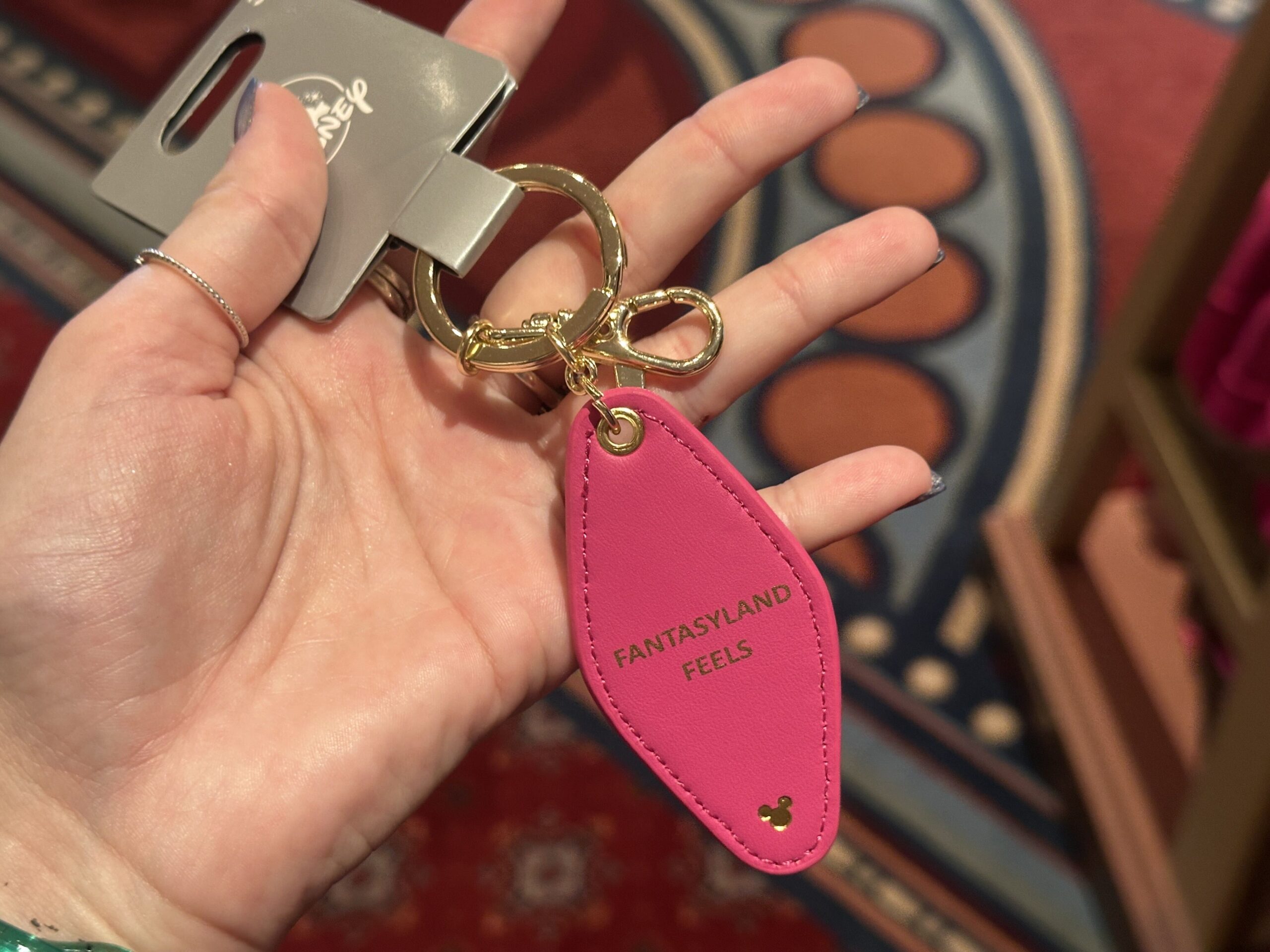 Logo Mania keychains have arrived at Walt Disney World, including attraction-inspired quote designs.