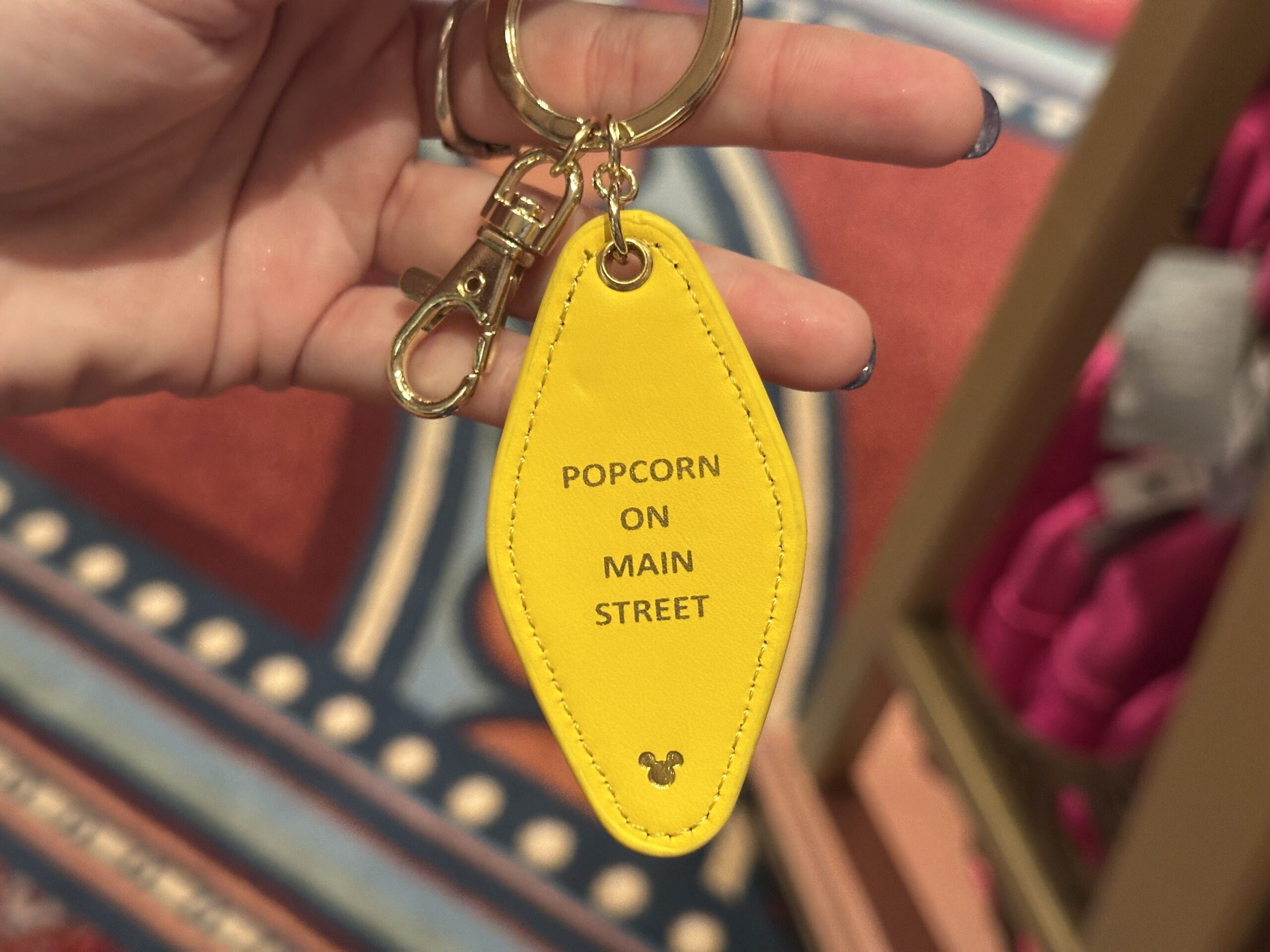Logo Mania keychains have arrived at Walt Disney World, including attraction-inspired quote designs.