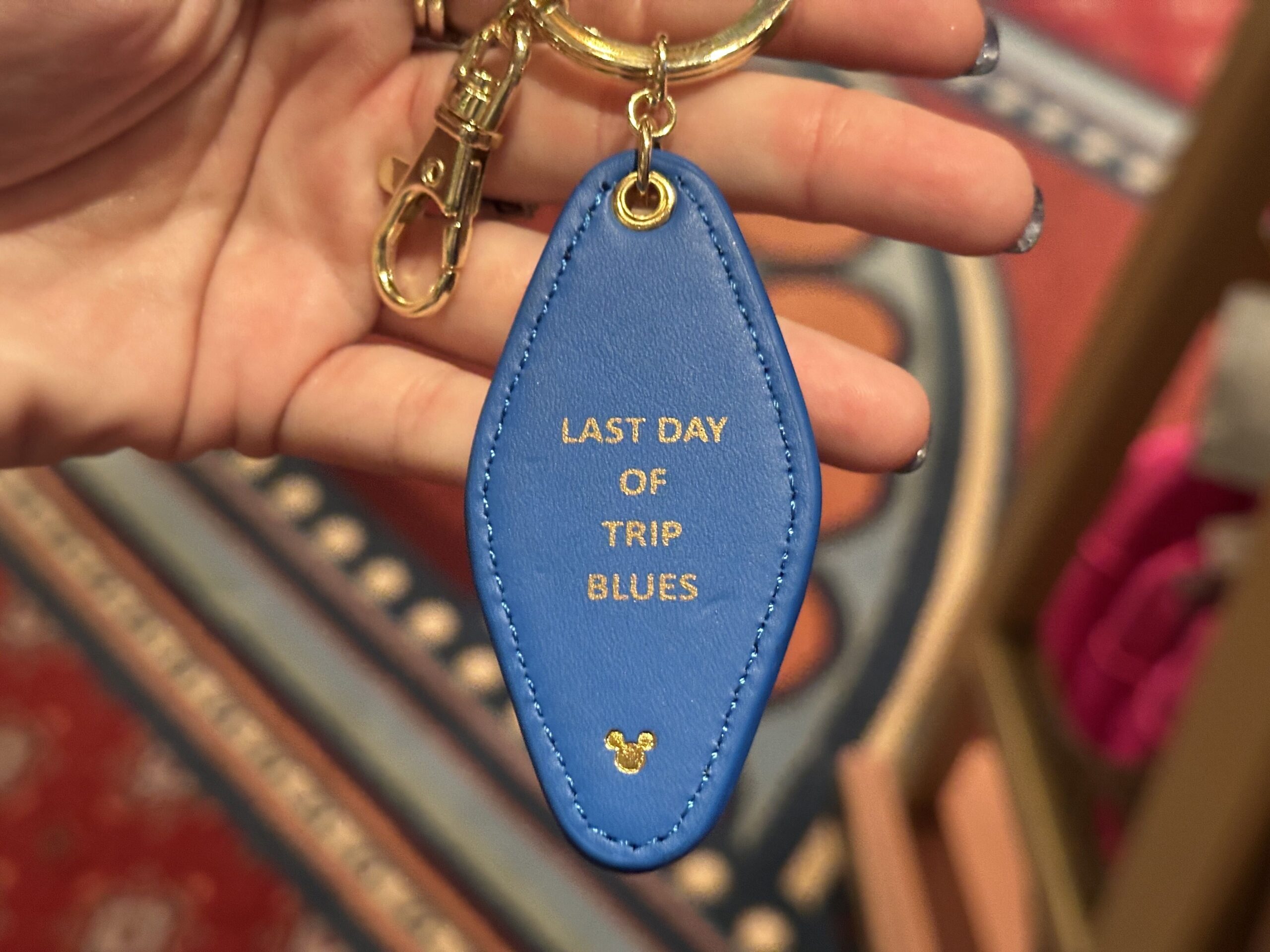 Logo Mania keychains have arrived at Walt Disney World, including attraction-inspired quote designs.