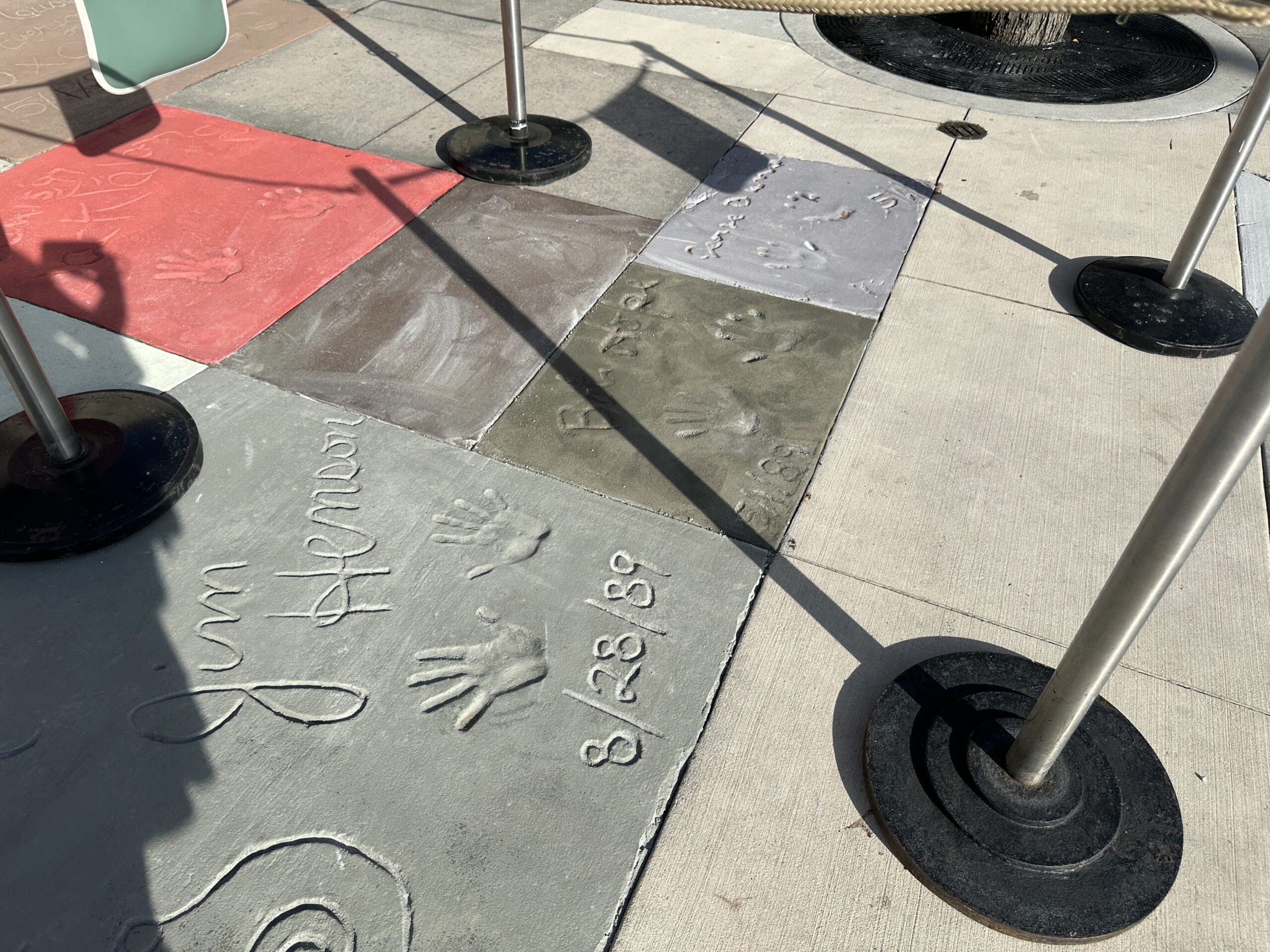 Construction crews are replacing sections of themed pavement and Walk of Fame-style concrete slabs outside the Chinese Theatre at Disney's Hollywood Studios.