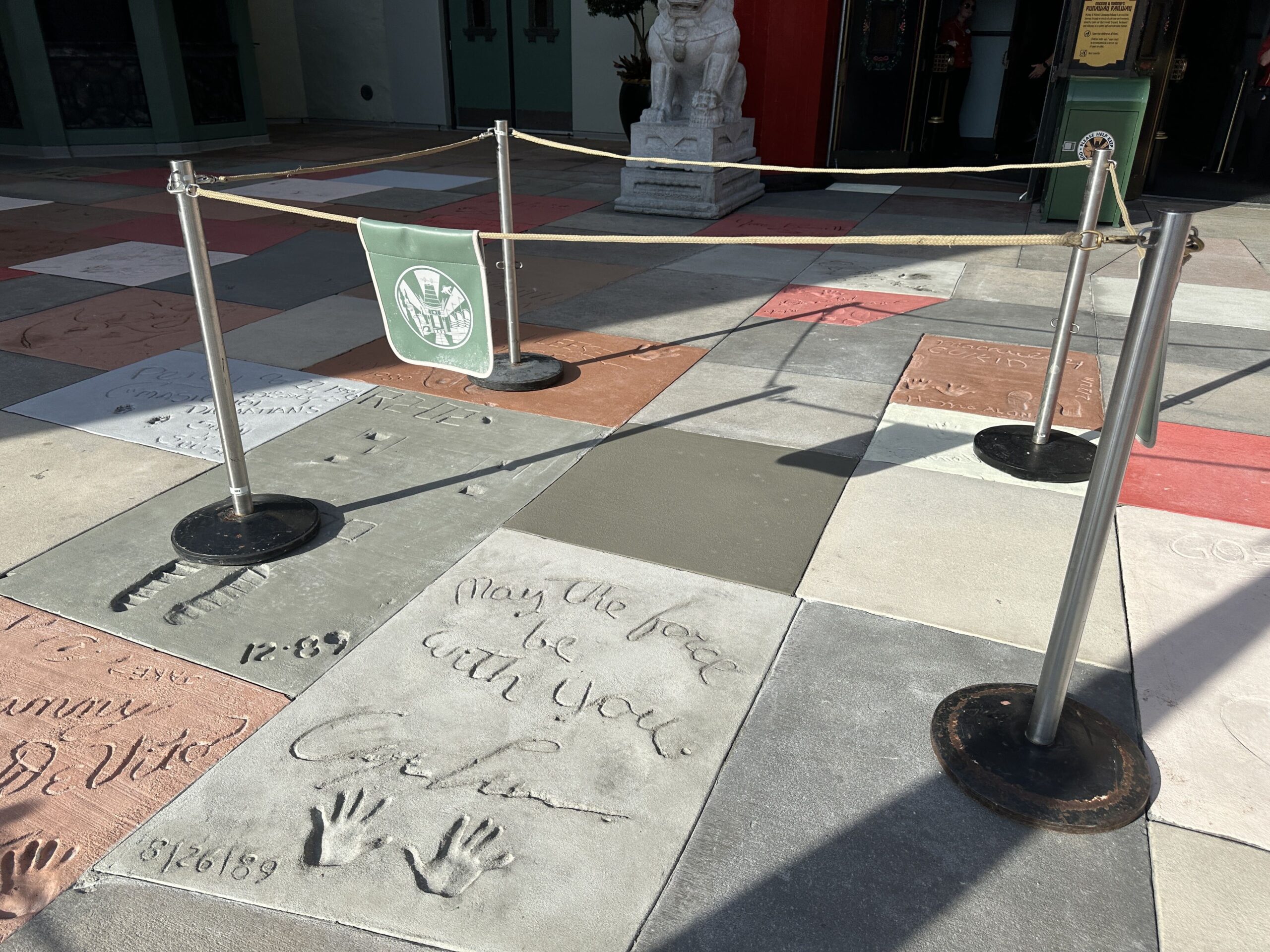 Construction crews are replacing sections of themed pavement and Walk of Fame-style concrete slabs outside the Chinese Theatre at Disney's Hollywood Studios.