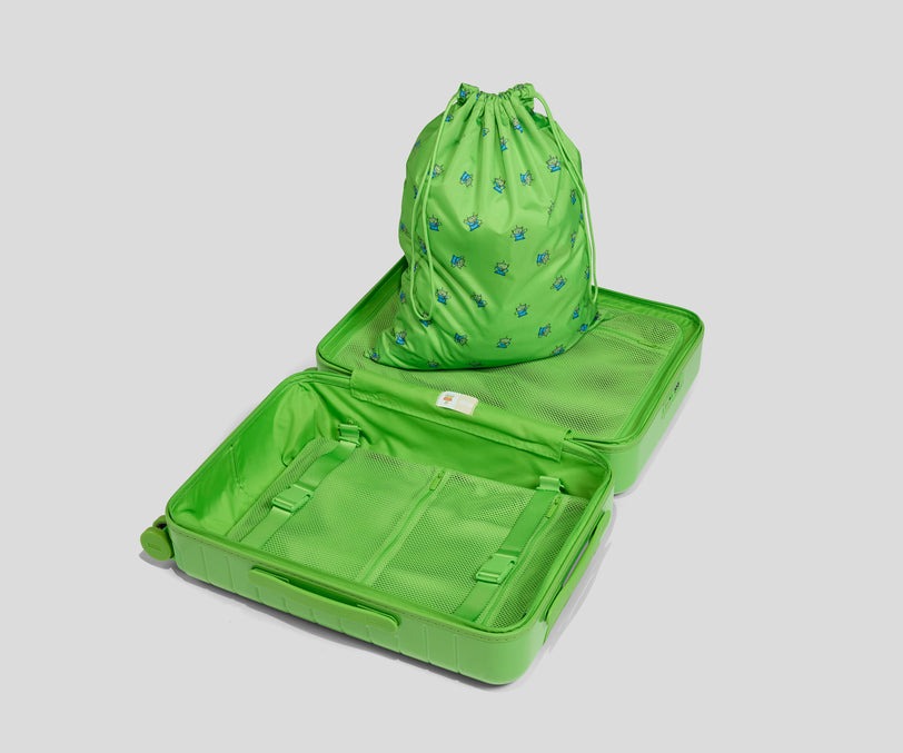 The Little Green Alien-inspired bag has a high-gloss finish.